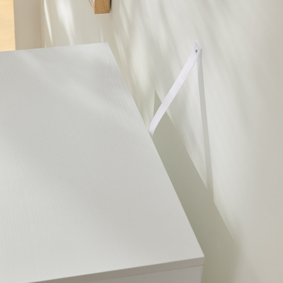 Anti-Tip Wall Strap