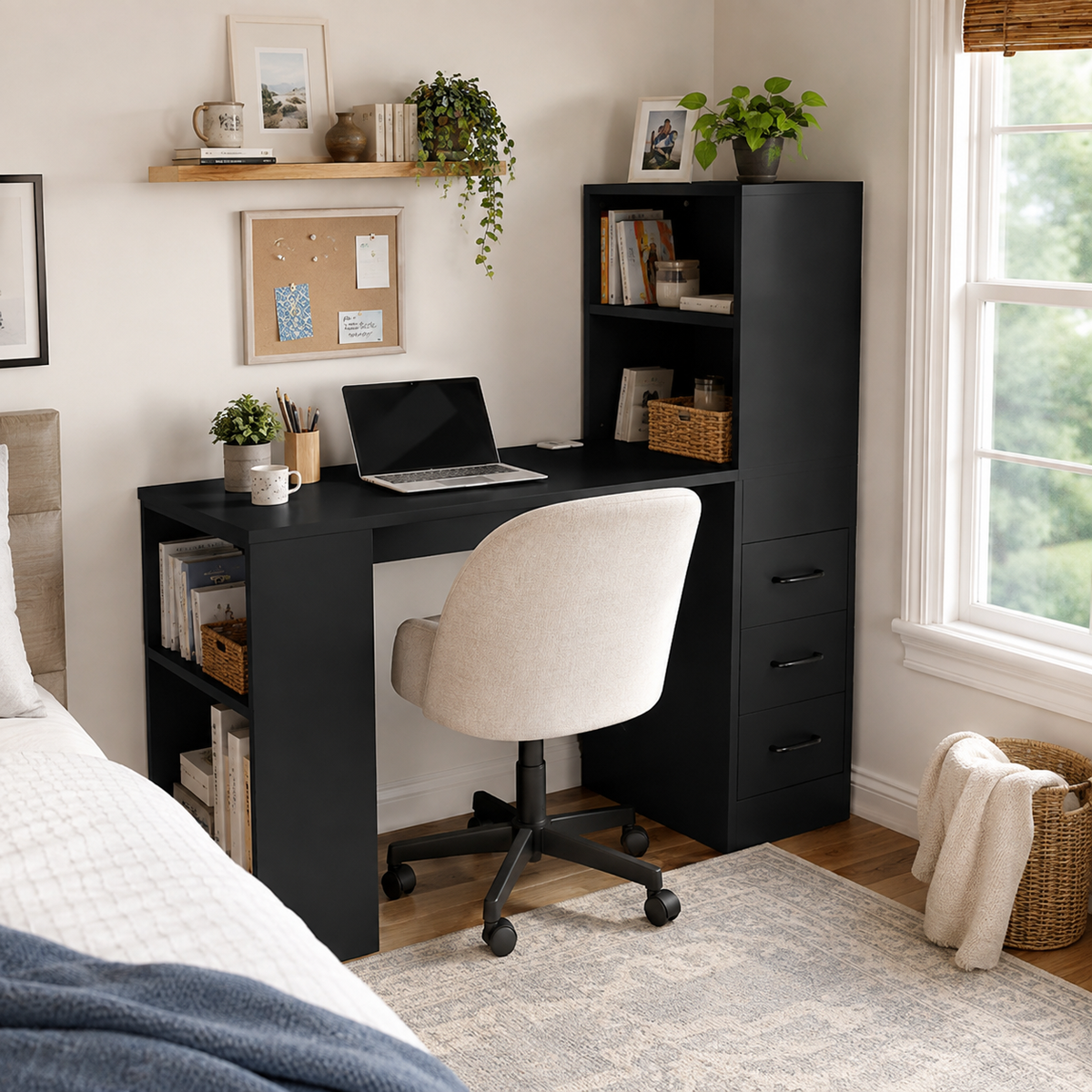 Aalto black computer desk showing a compact workspace with shelving beside a bed and window