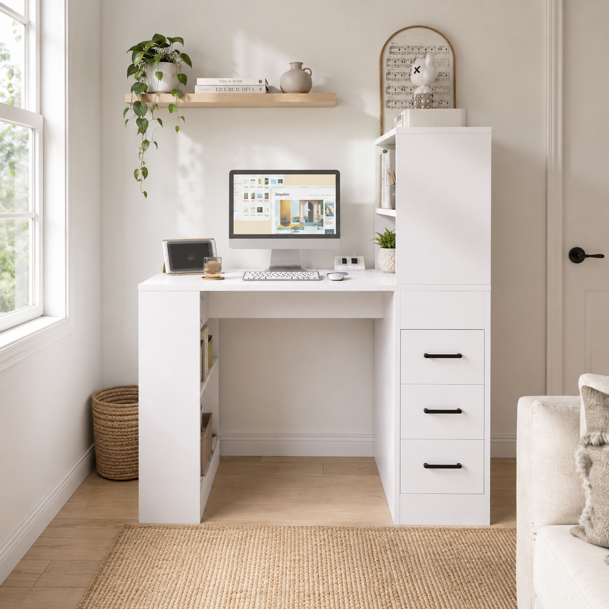 Aalto white computer desk showing a monitor, storage hutch and three drawers in a neutral room