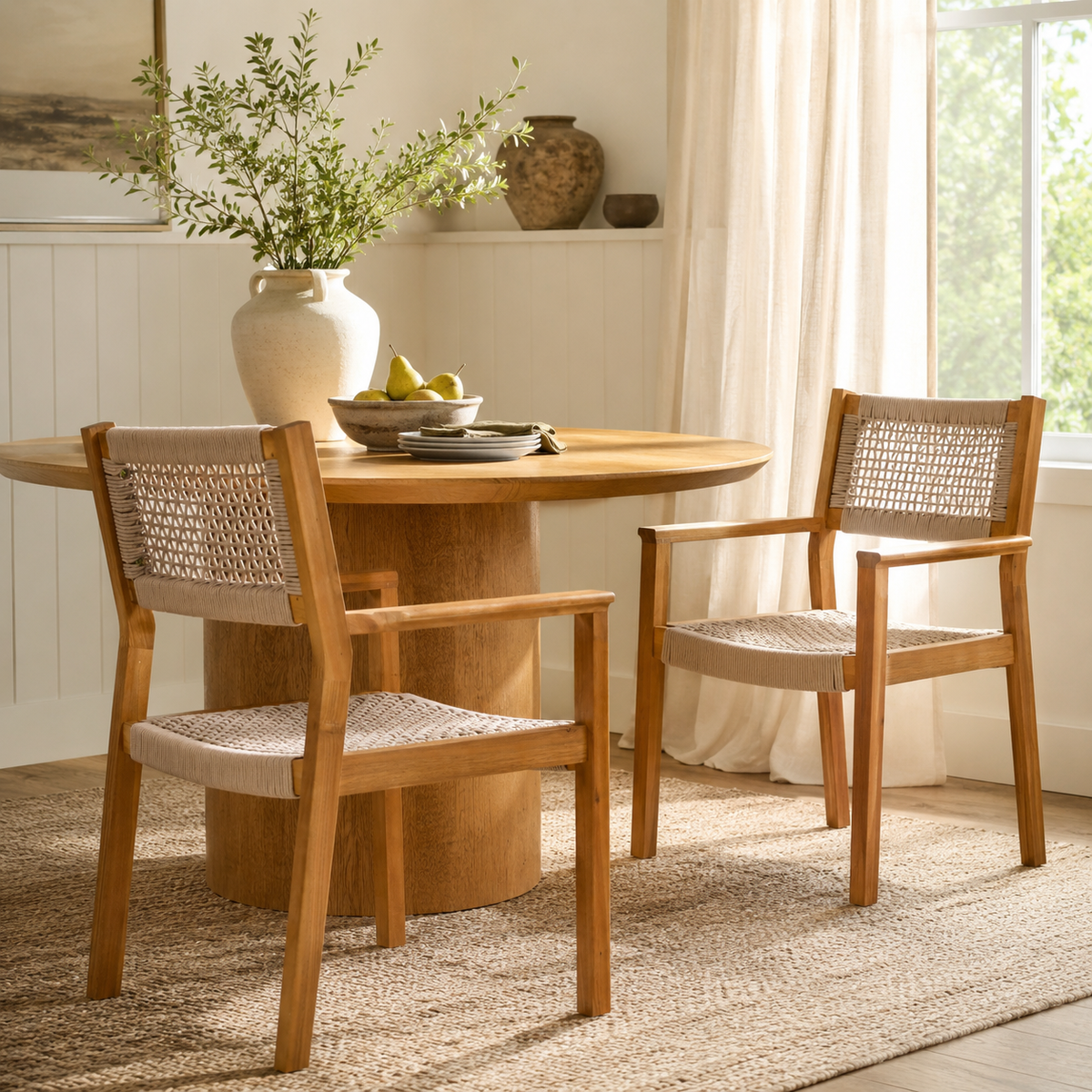 Aare light camel acacia wood dining chairs shown in a warm dining space