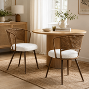 Adige walnut dining chair showing a pair beside a rectangular wood dining table in a sunlit room