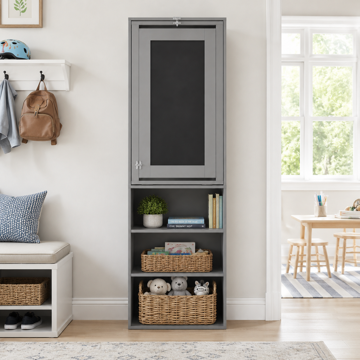 Aero grey fold-out desk showing the folded upright design with books and baskets in a bright room