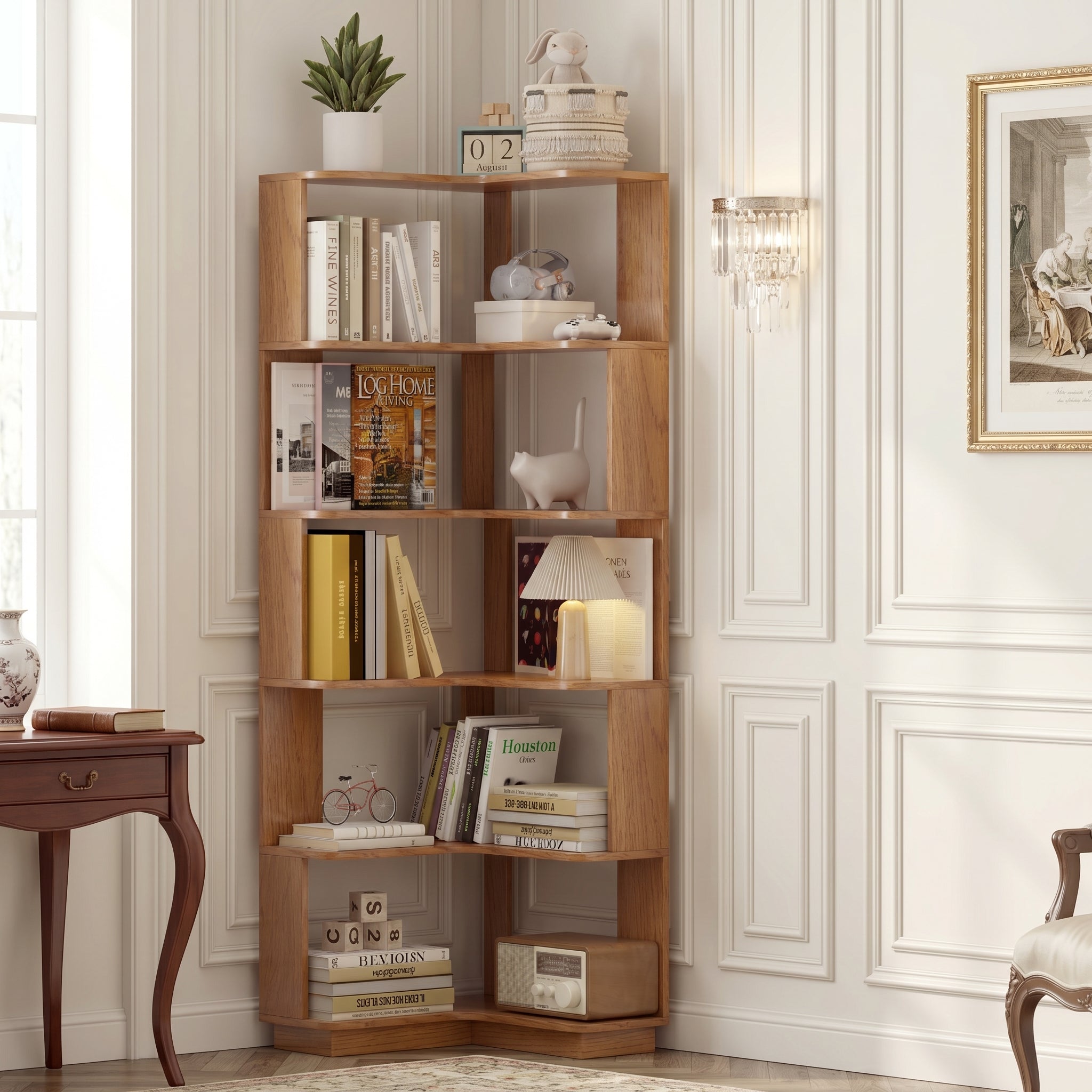 Agora oak corner bookshelf showing six open tiers beside framed wall art