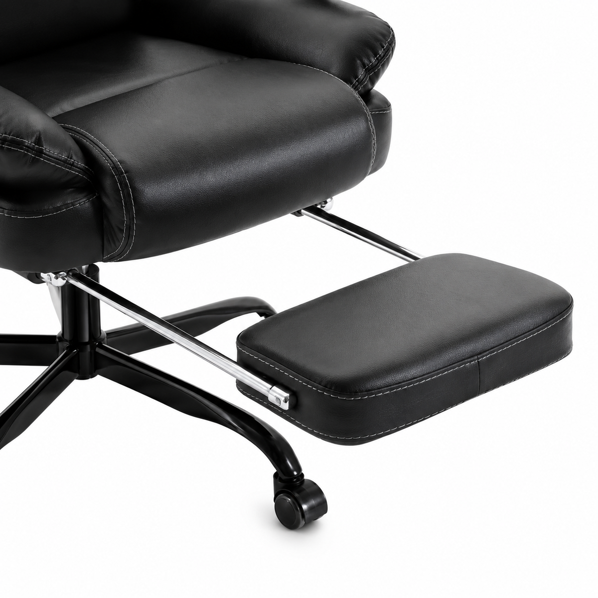 Alvik black office chair showing retractable footrest detail