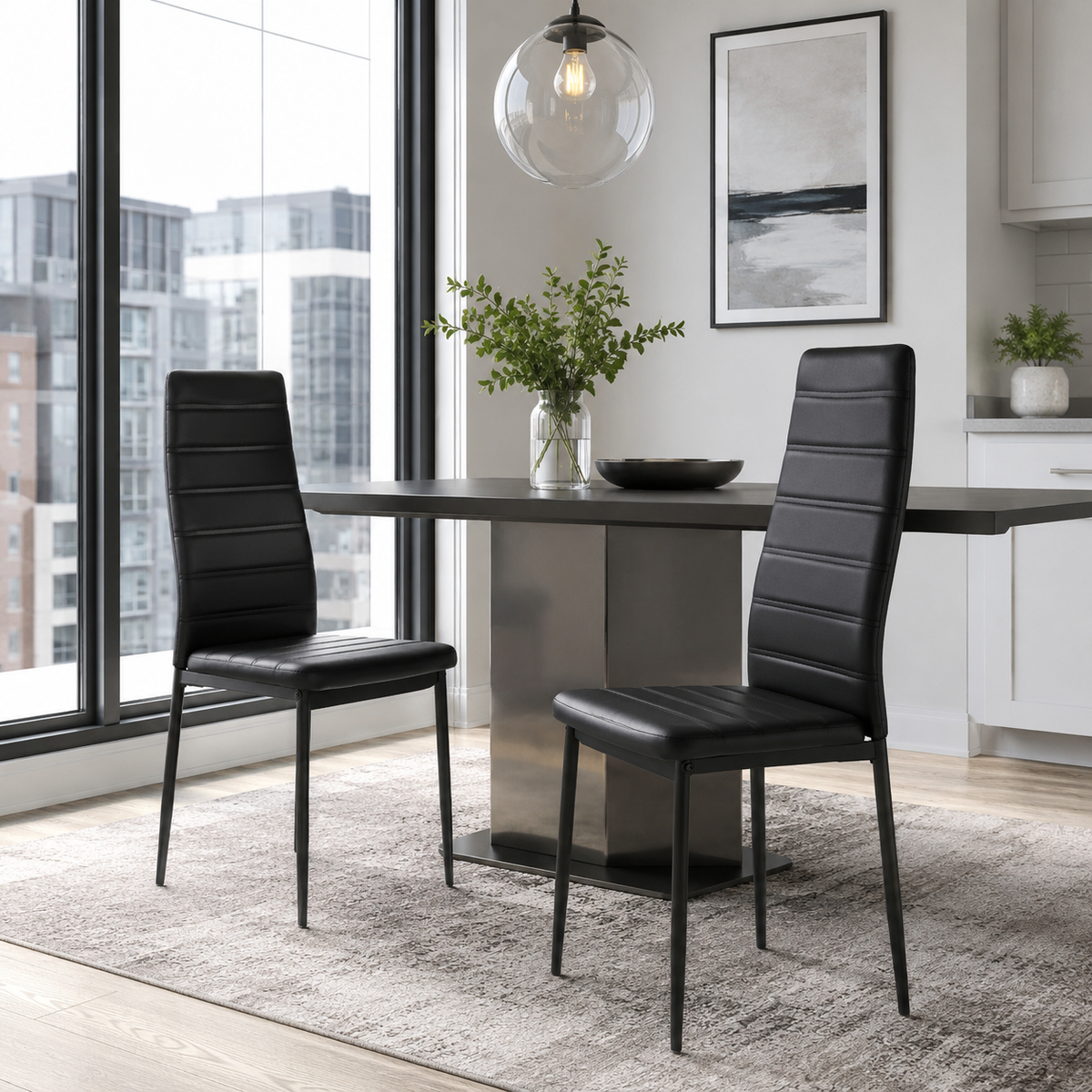 Ann black faux leather dining chair set of 2 styled at a round wood dining table in a bright dining corner