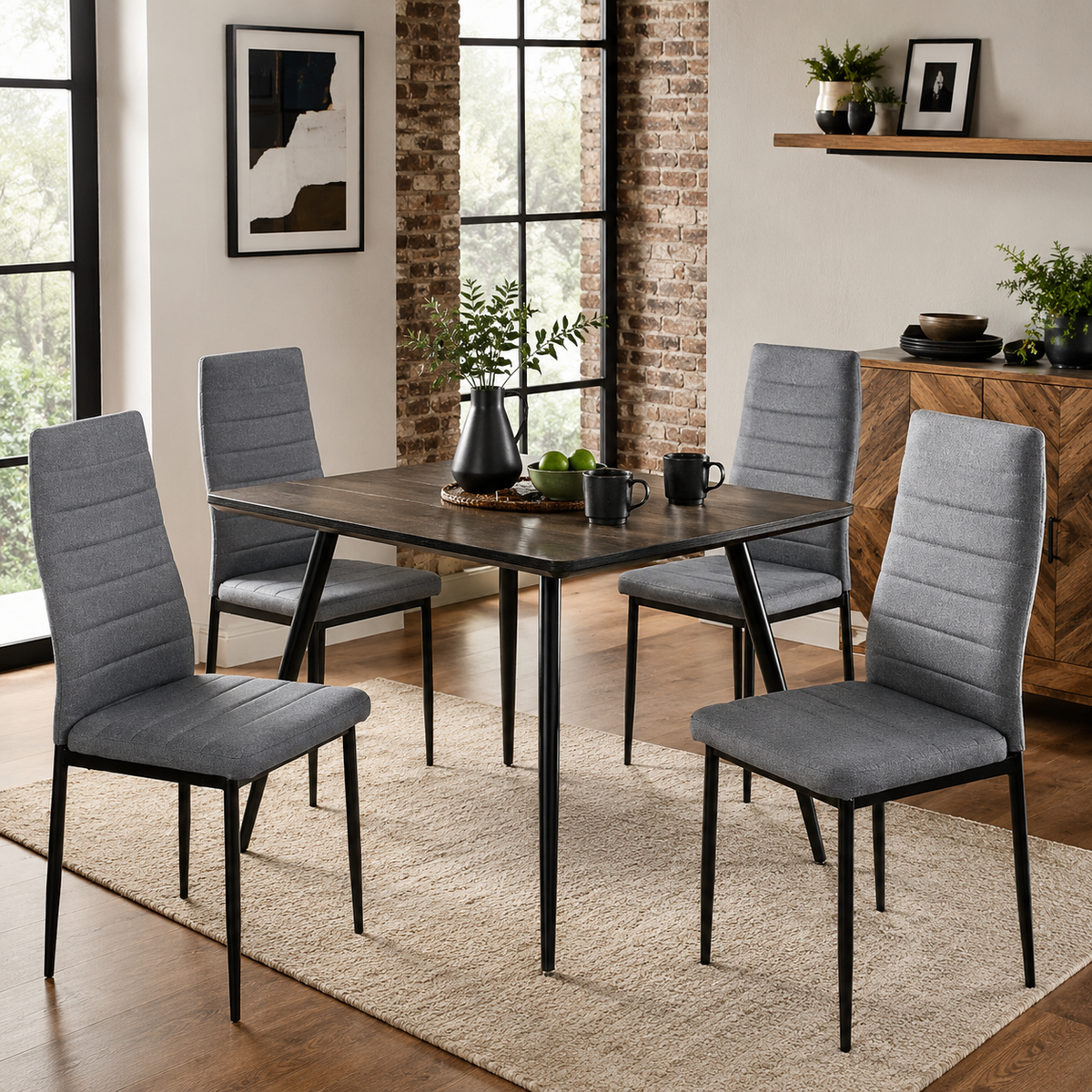 Ann grey high back upholstered dining chairs with black metal legs set of 4 around a rectangular dining table in a bright dining room