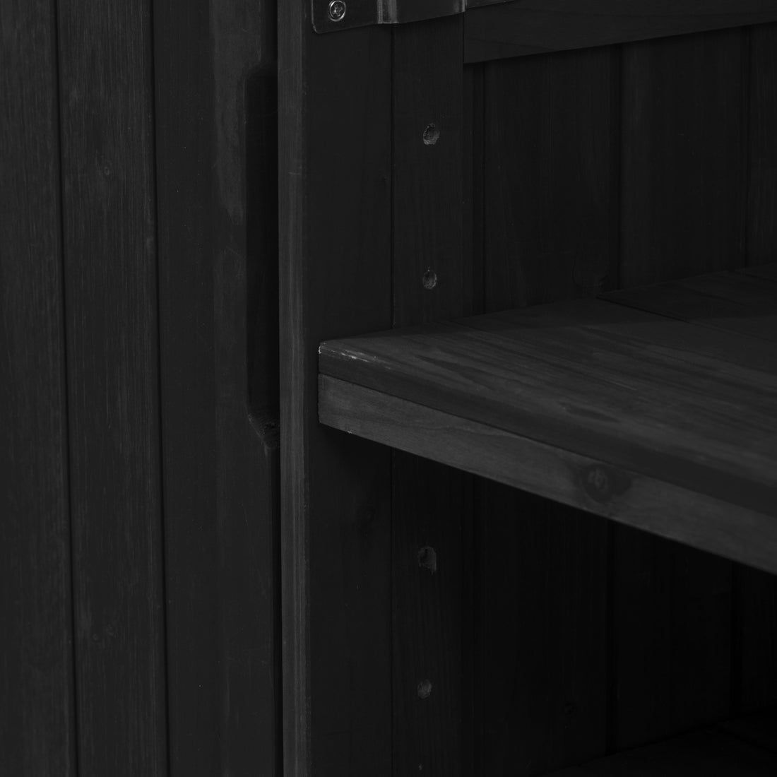 Antibes black outdoor kitchen island showing adjustable storage shelf and integrated recessed handle for flexible organization and easy access