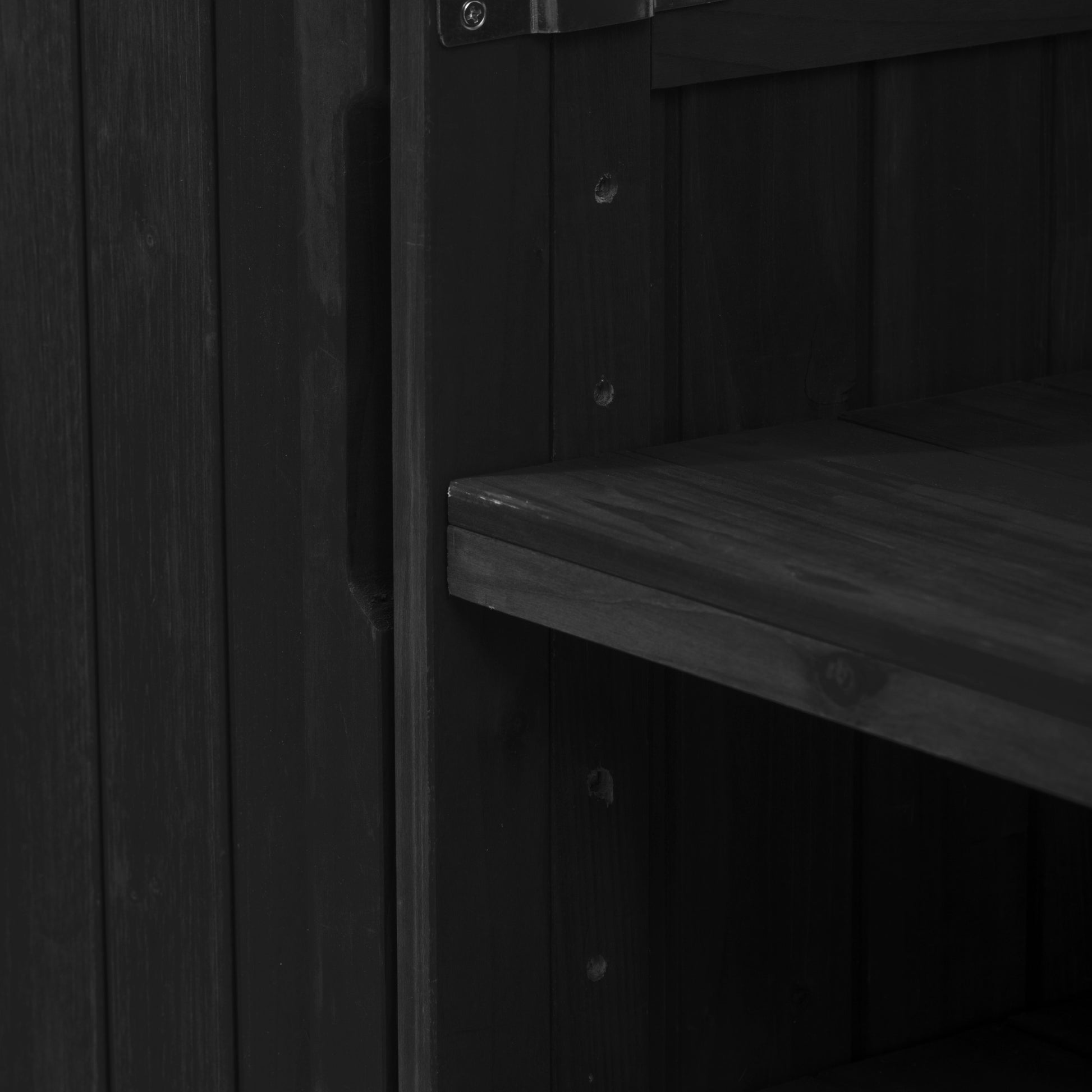 Antibes black outdoor kitchen island showing adjustable storage shelf and integrated recessed handle for flexible organization and easy access