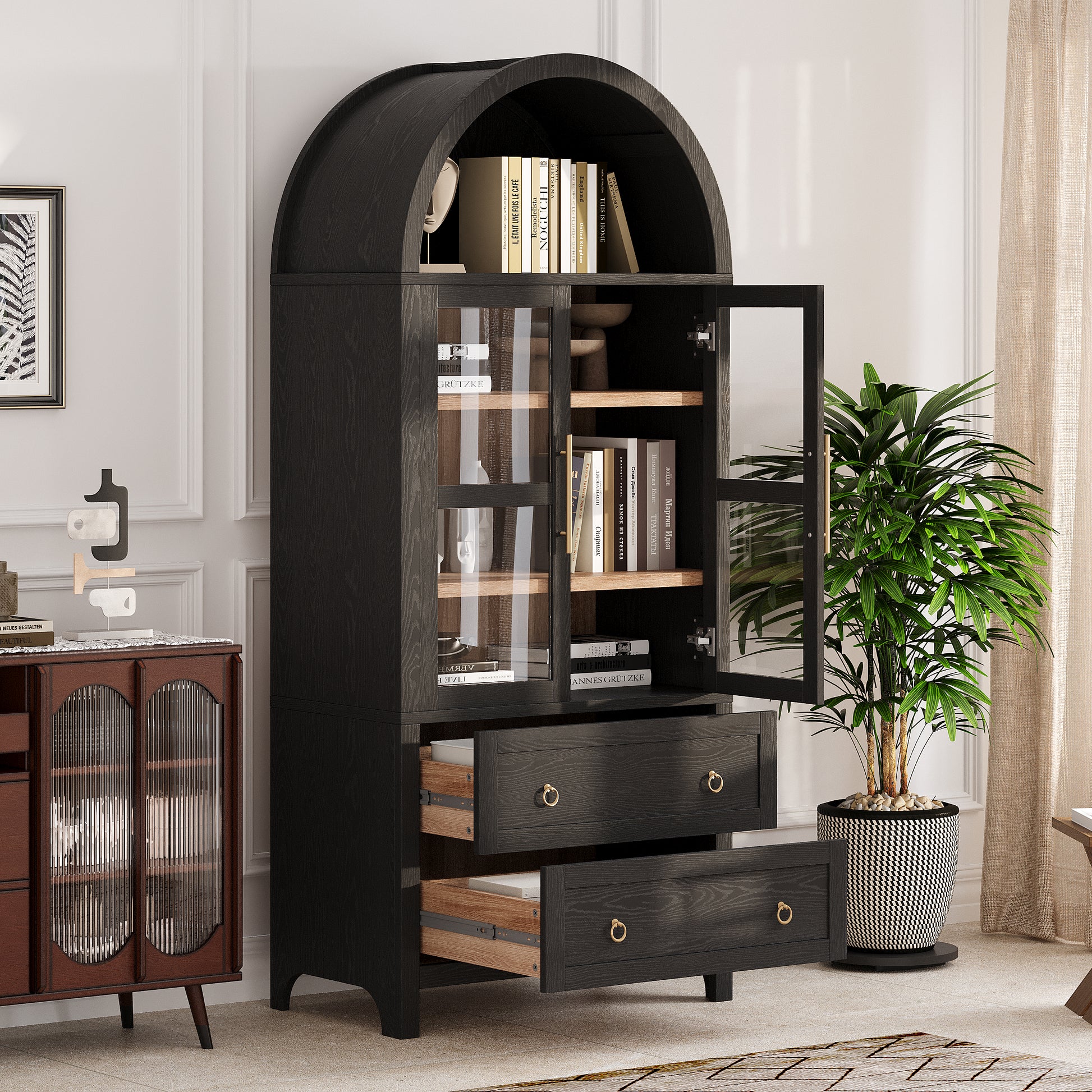 Black Artisan 71 - inch arched pantry cabinet with glass doors, adjustable shelves, and open drawers styled in a modern farmhouse living and dining space