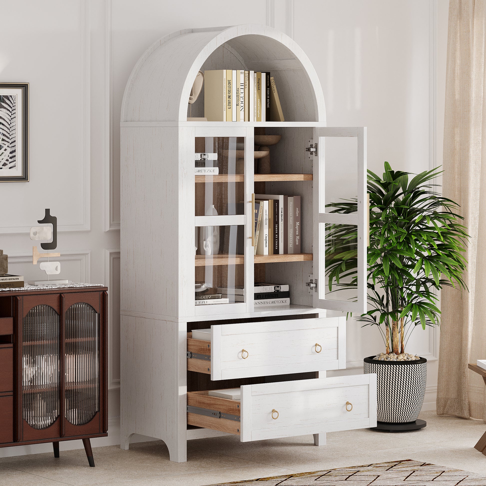 White Artisan 71 - inch arched pantry cabinet with open glass door, adjustable shelves, and extended storage drawers styled in a modern farmhouse living space