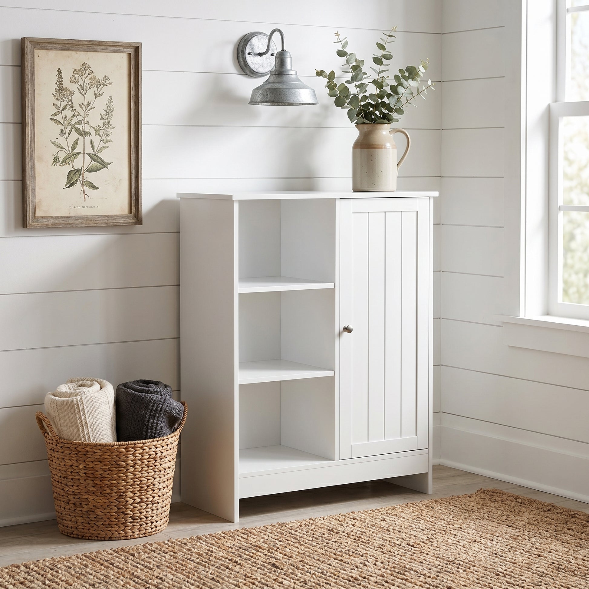 Barcelona white storage cabinet showing a warm interior scene with tabletop decor