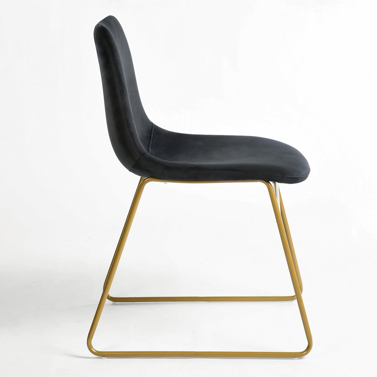 Batassel black velvet dining chair side view on white background