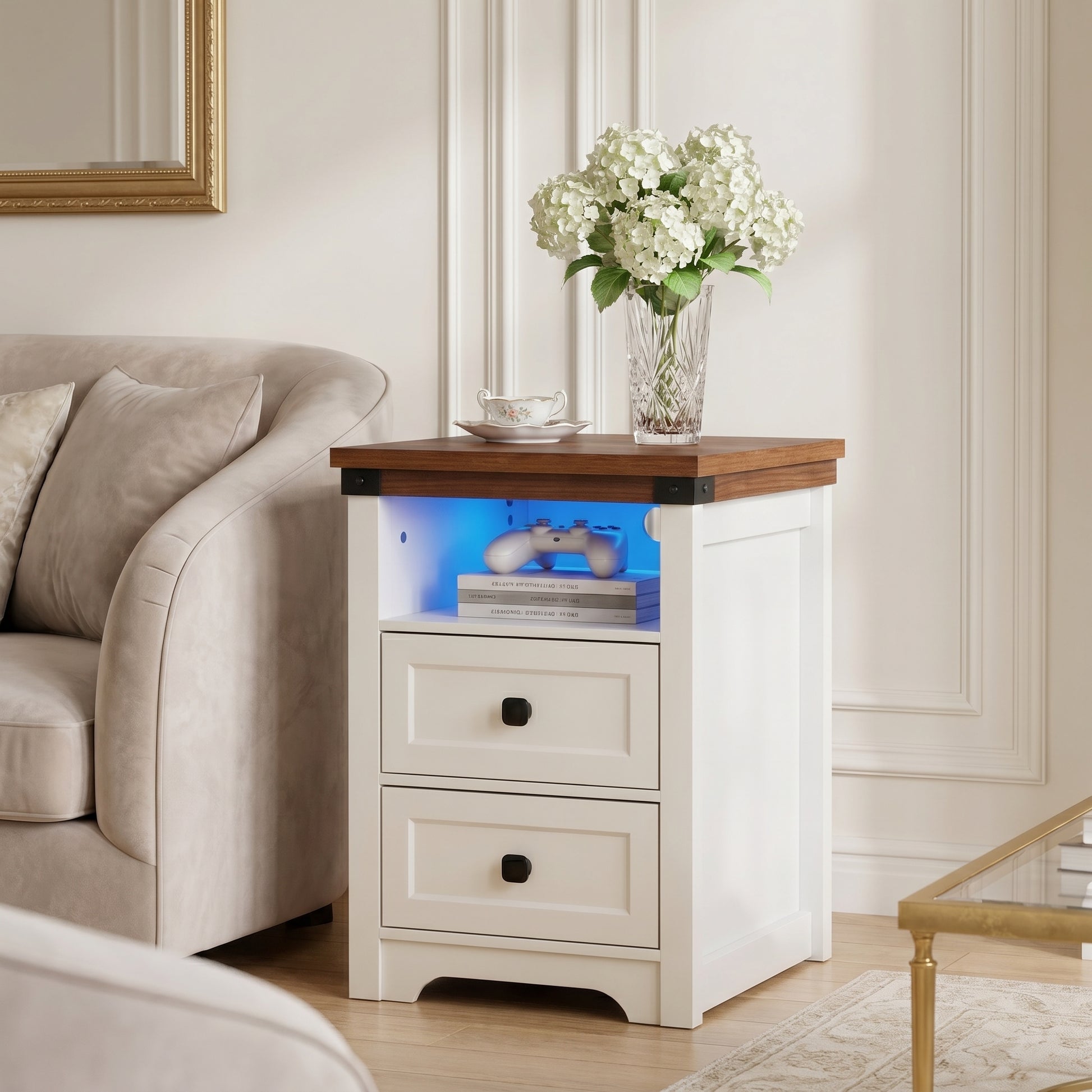 Benton white nightstand showing angled front view beside a sofa