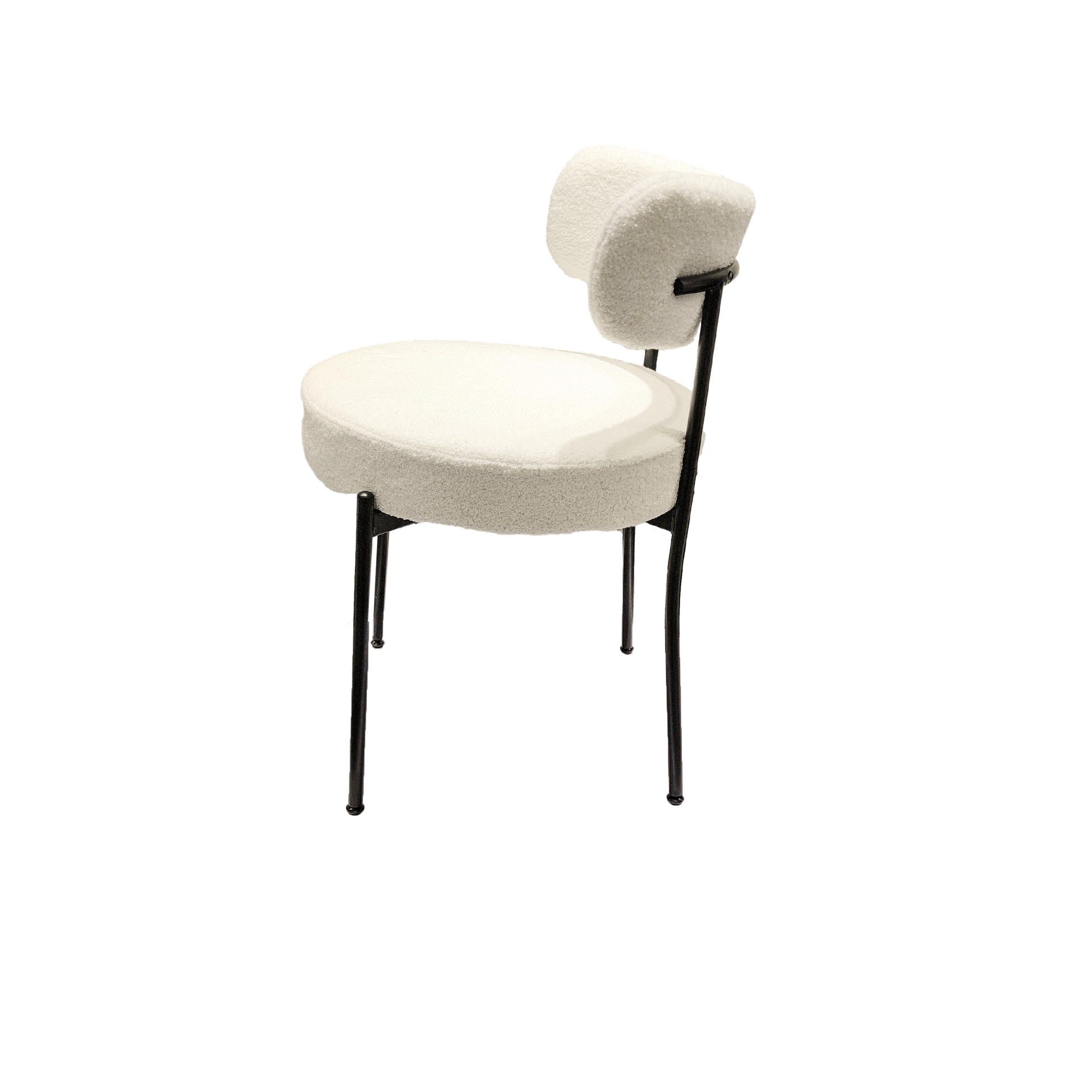 Bled white upholstered dining chair side view with black metal legs on white background