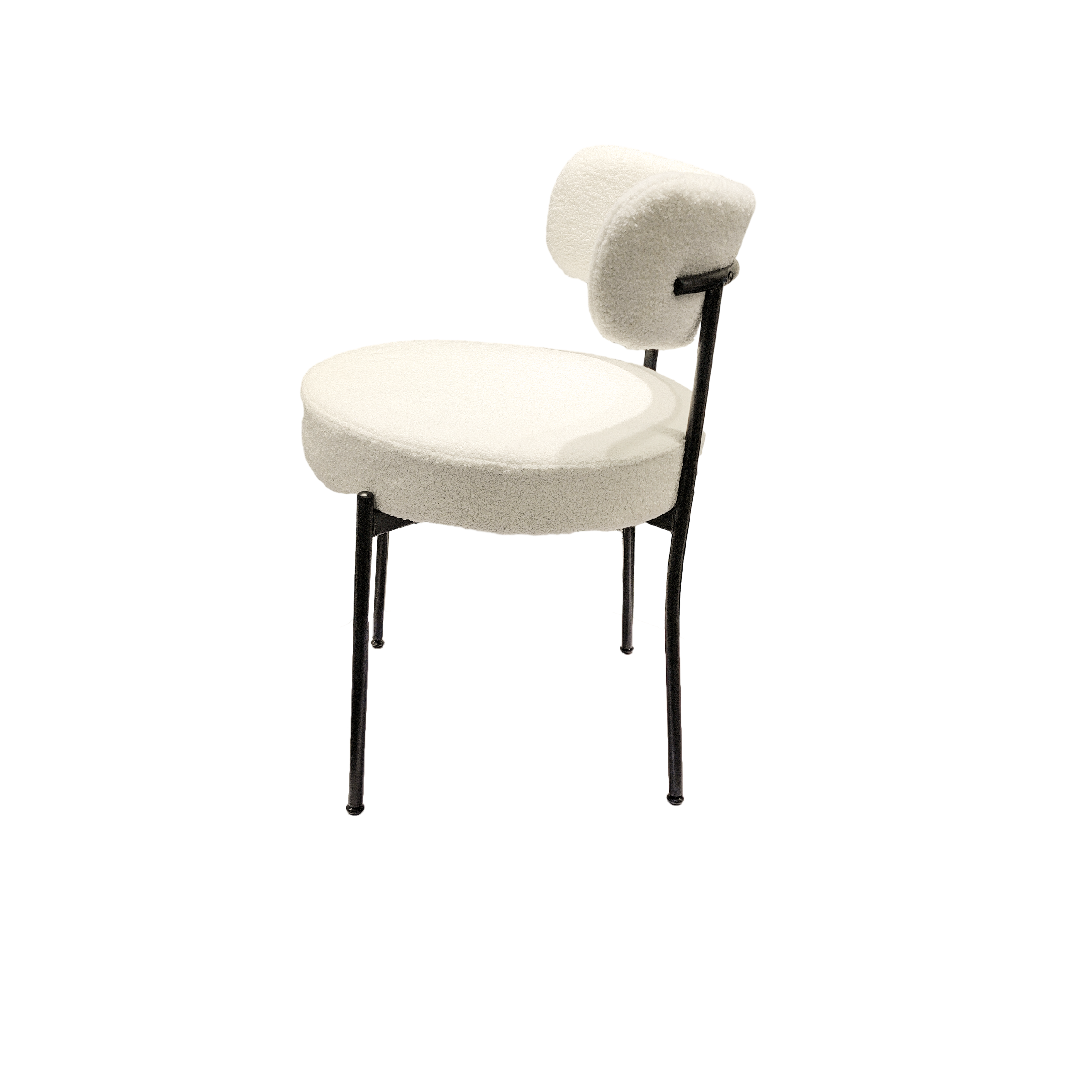 Bled white upholstered dining chair side view with black metal legs on white background