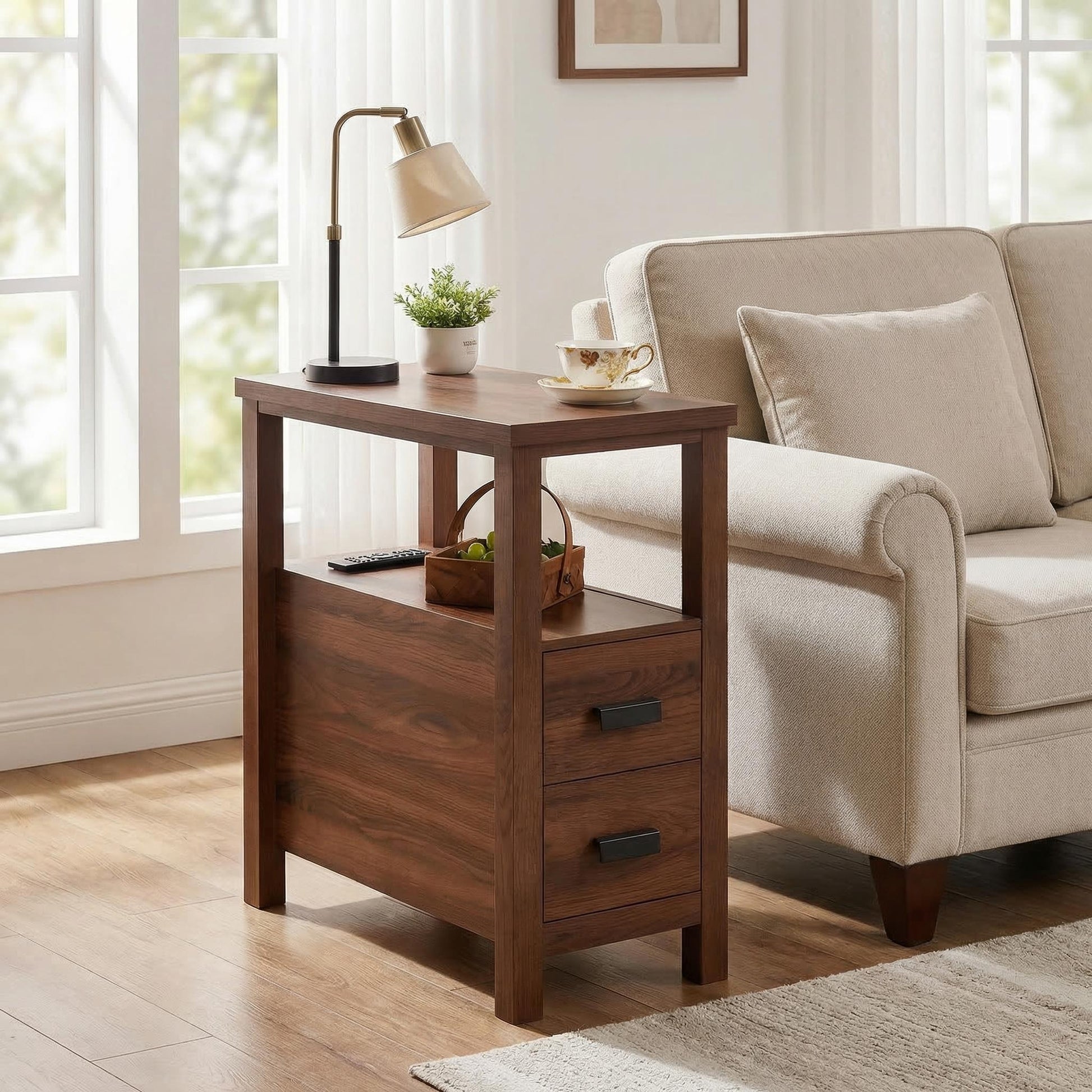 Branford walnut end table showing angled front view beside a sofa