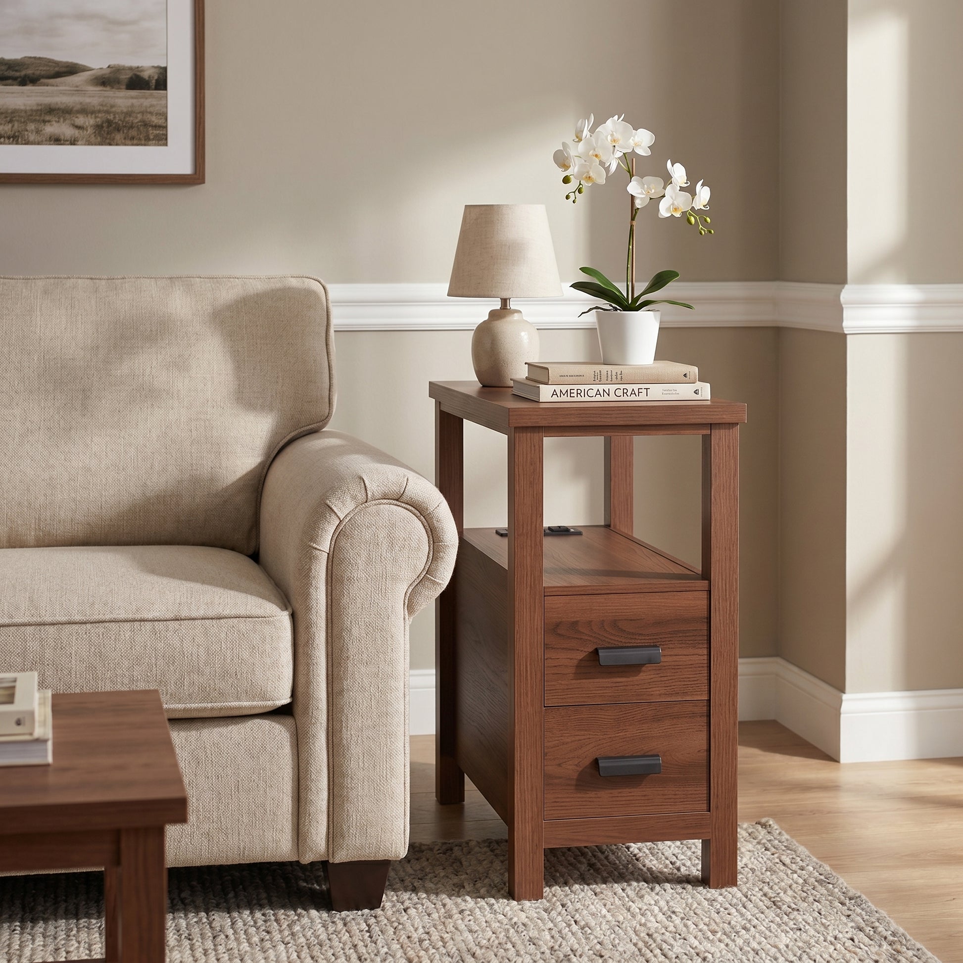 Branford walnut end table showing angled front view beside a sofa