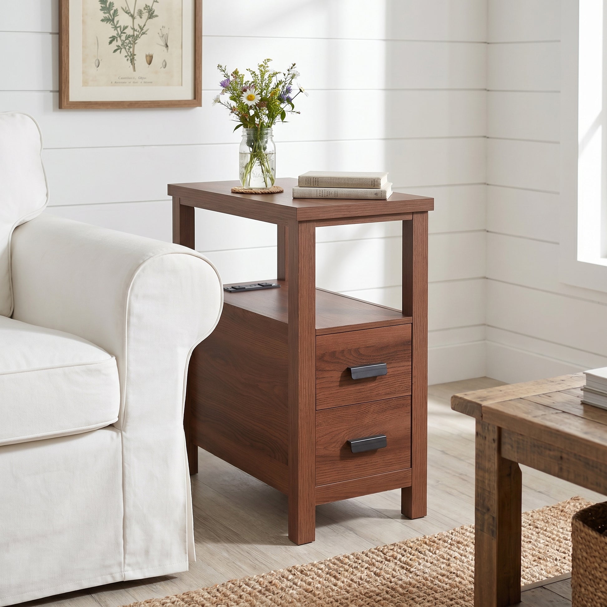 Branford walnut end table showing angled front view beside a sofa
