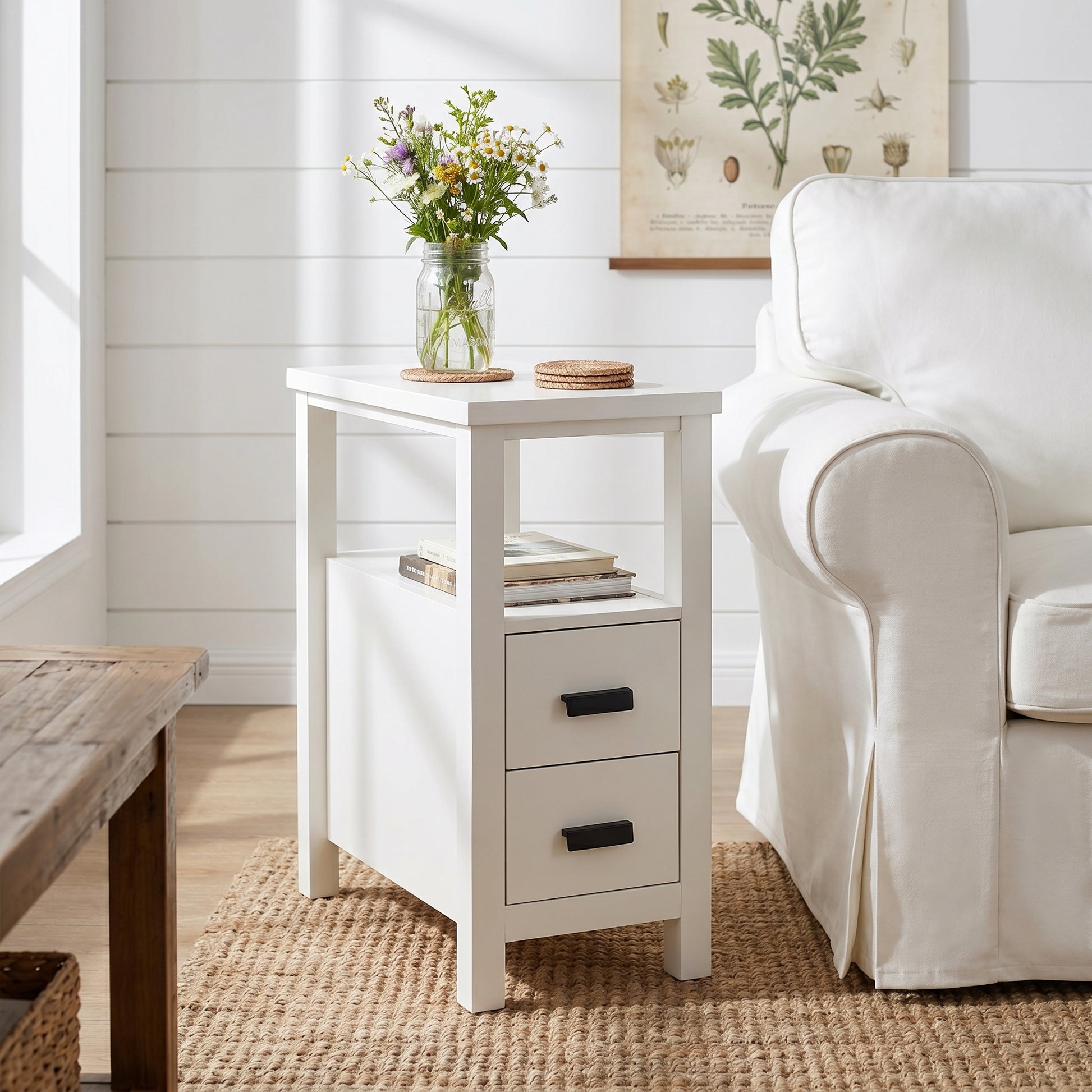 Branford white end table showing angled front view beside a sofa