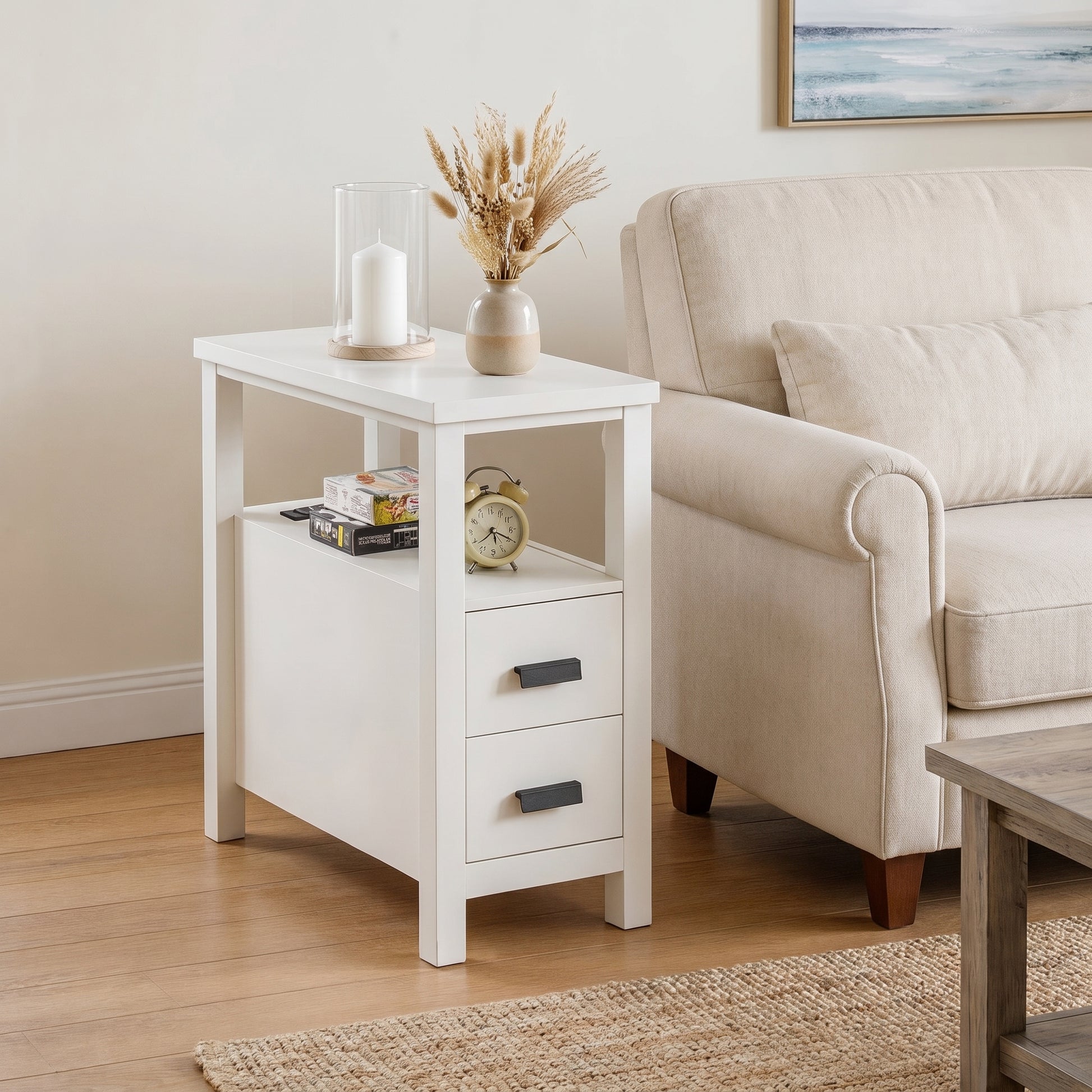 Branford white end table showing angled front view beside a sofa
