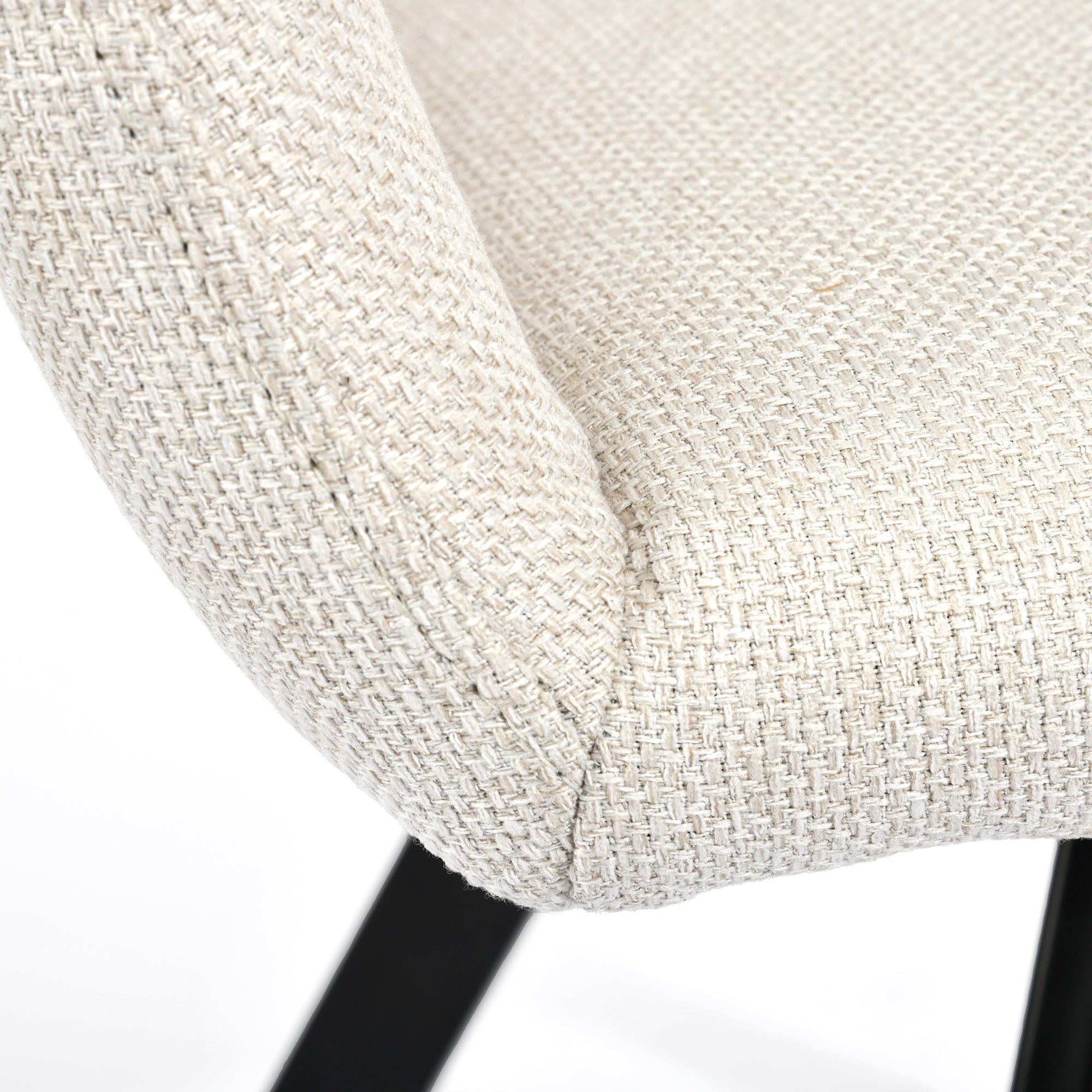 California beige swivel dining chair showing upholstery seam detail