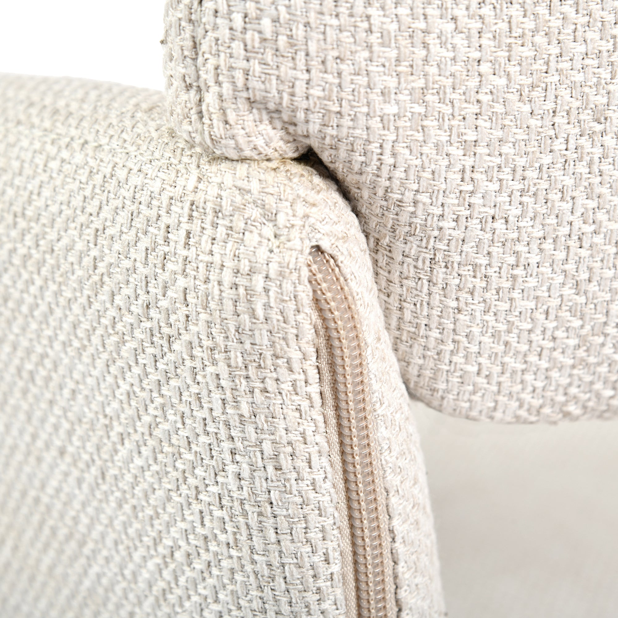California beige swivel dining chair showing inner arm and stitching detail