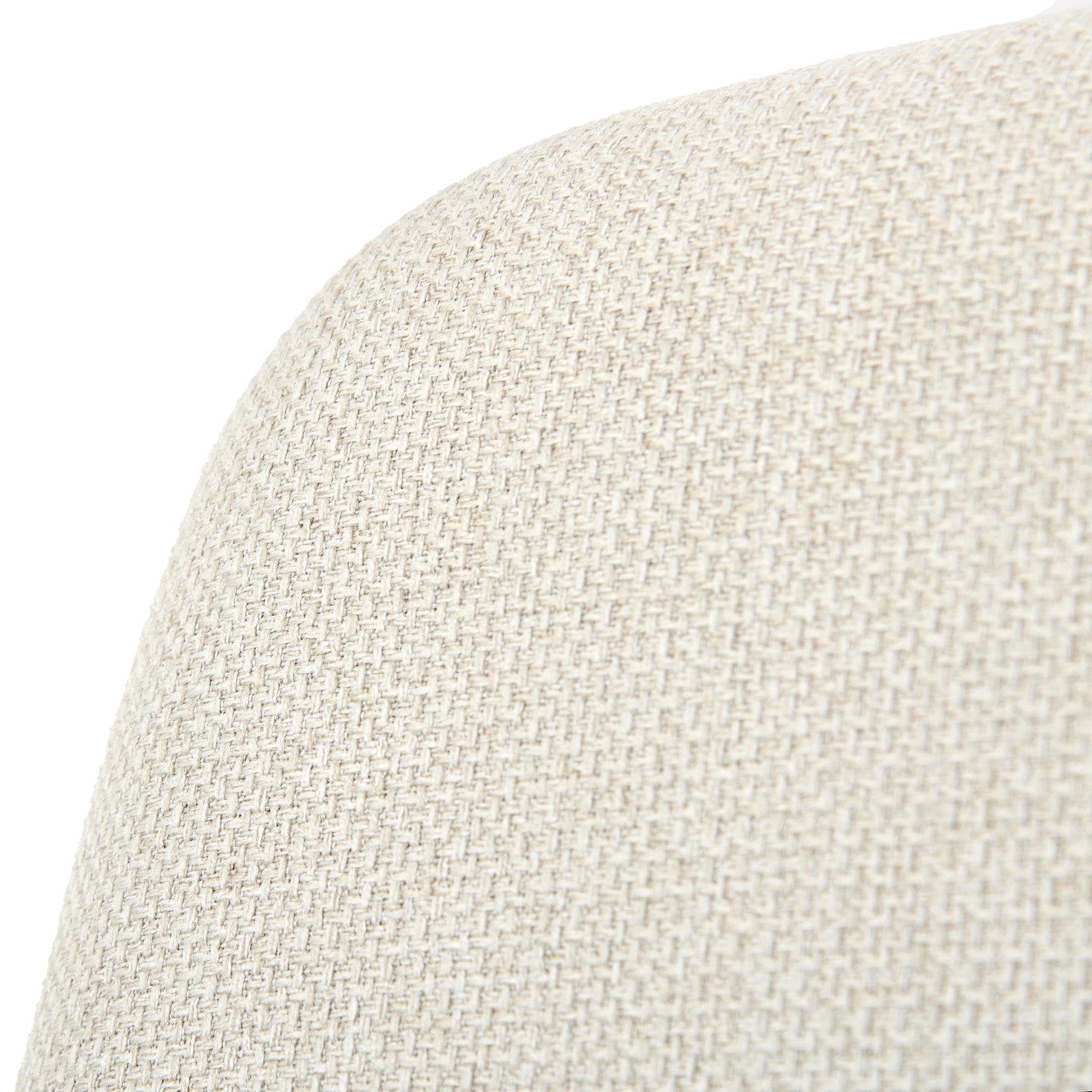 California beige swivel dining chair showing curved edge fabric detail