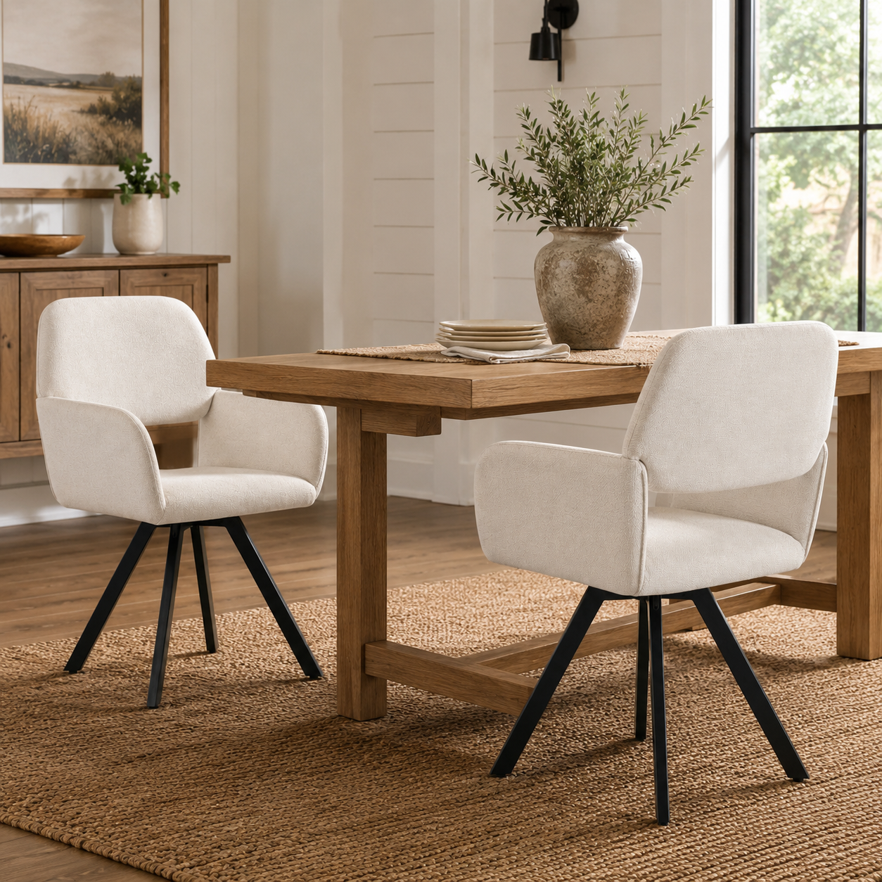 California beige swivel dining chairs shown at a round dining table