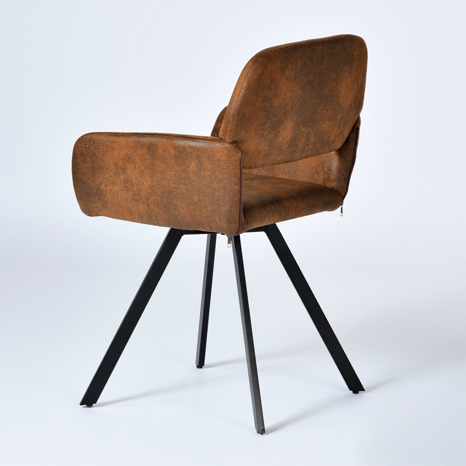 California suede brown swivel dining chair angled view on white background