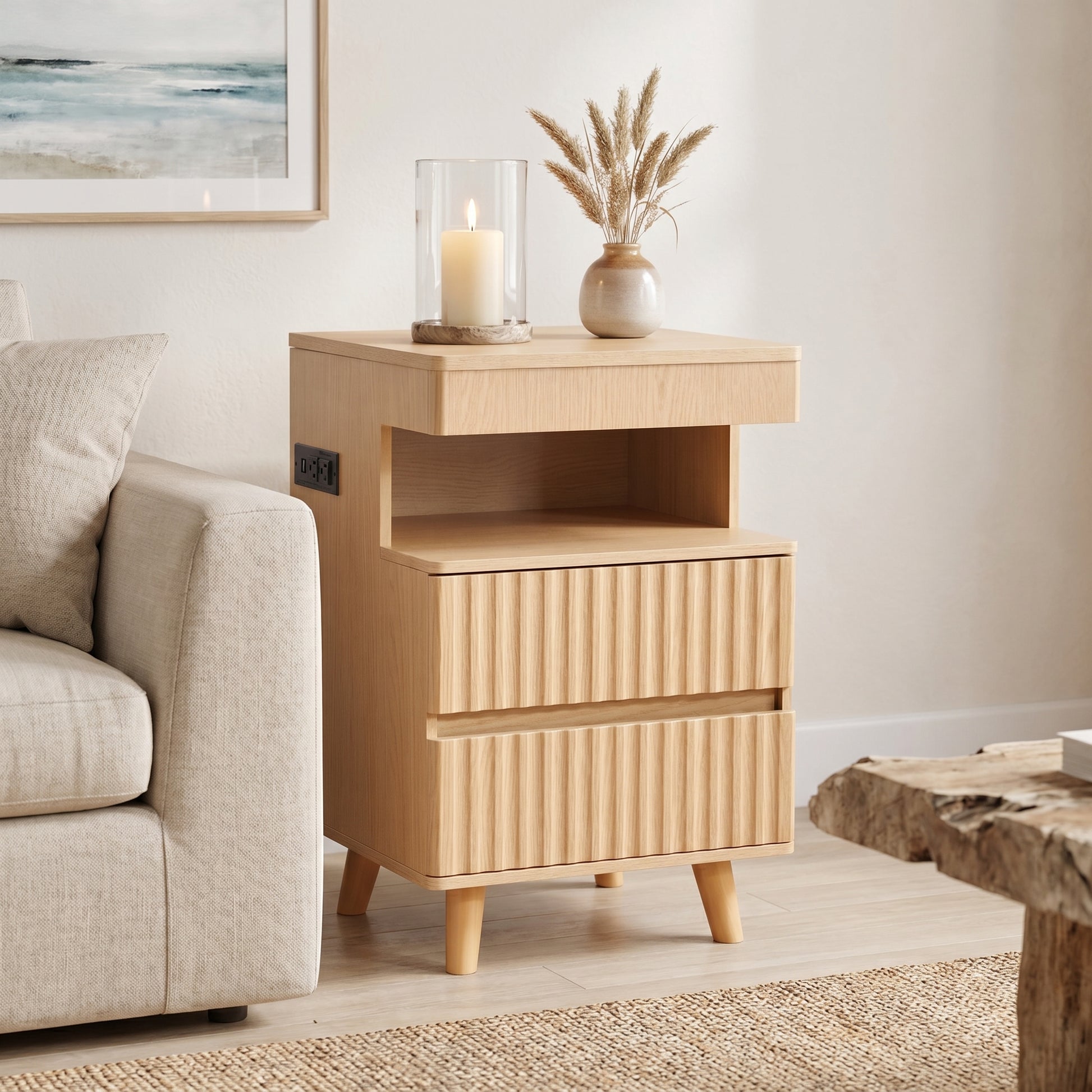 Calven oak nightstand showing angled front view beside a sofa