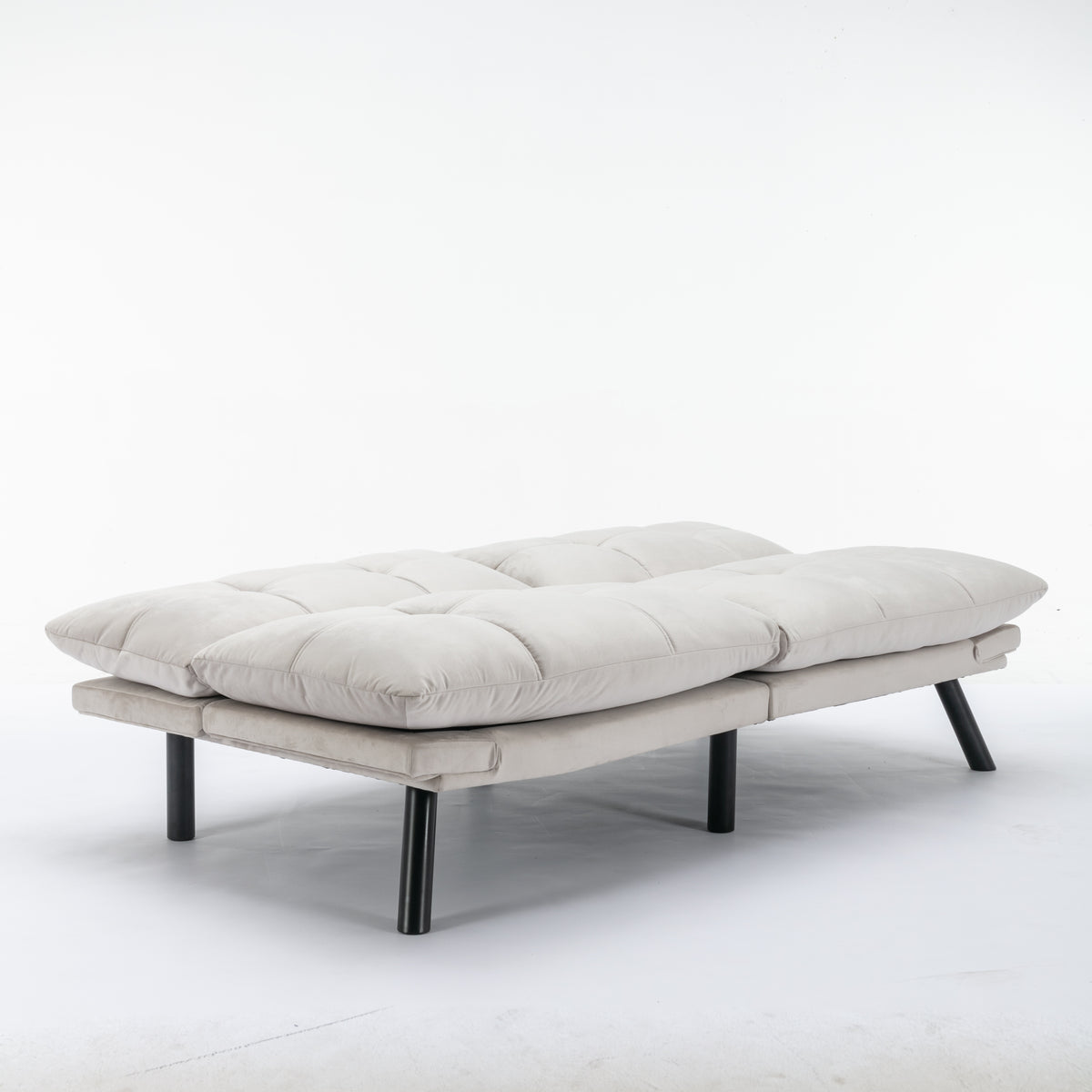 Carmel beige futon sofa bed shown flat in bed configuration on white background