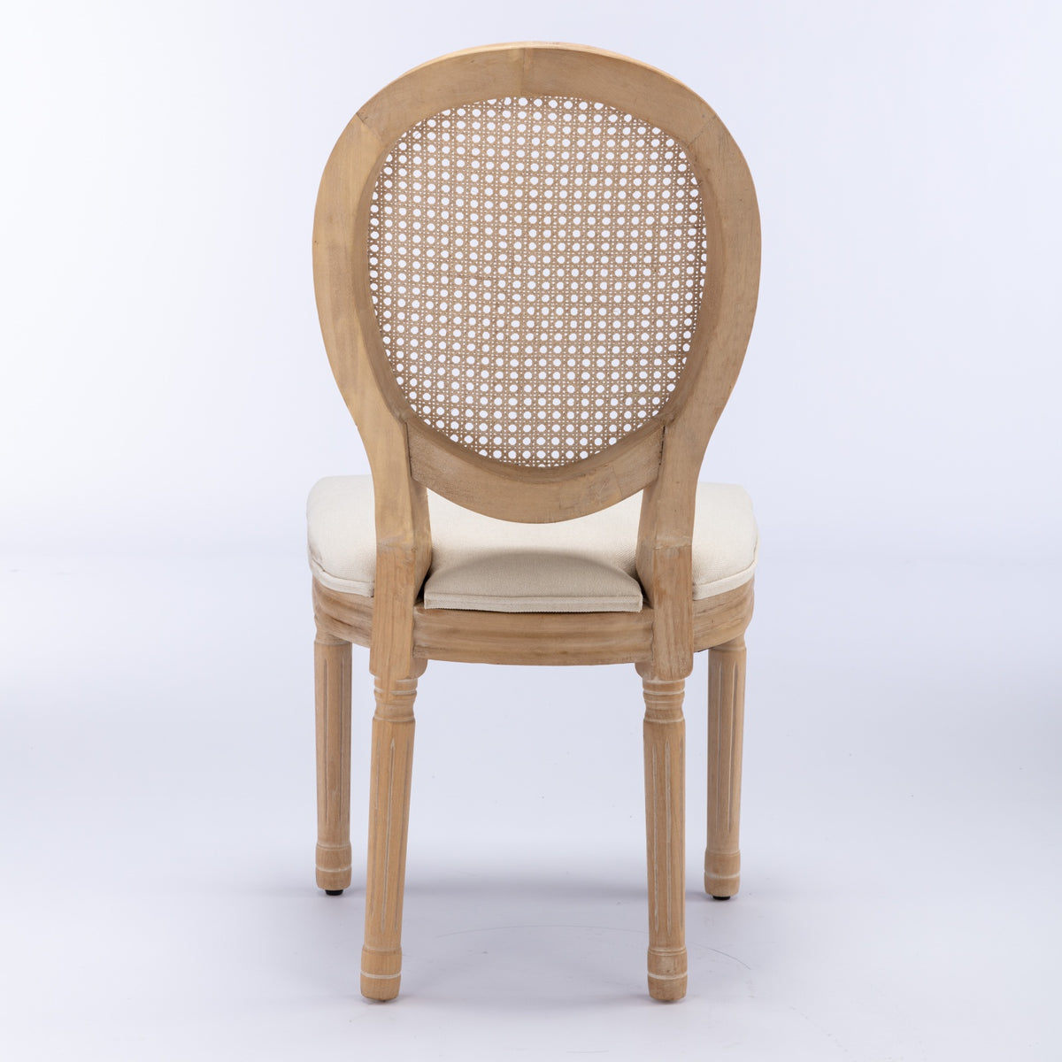 Celeste white dining chair rear view with natural cane medallion back on white background