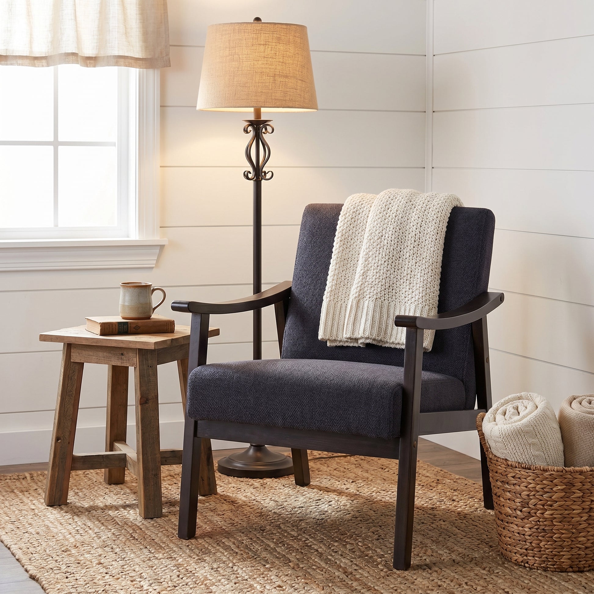 Champlain black accent chair showing a living room scene with round side table