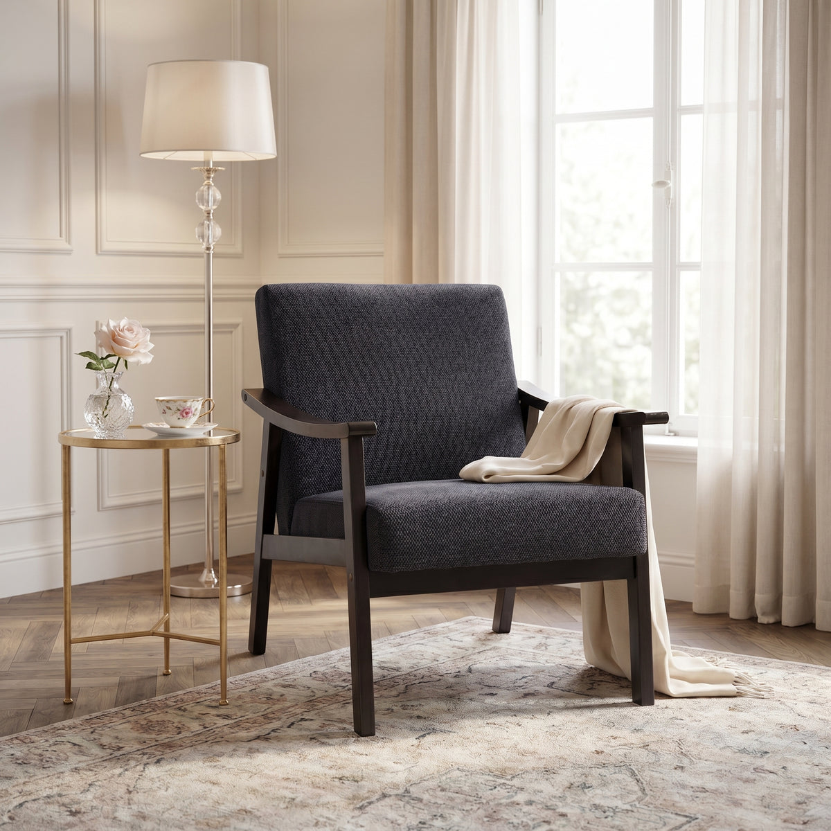 Champlain black accent chair showing a cozy seating corner with plant and decor