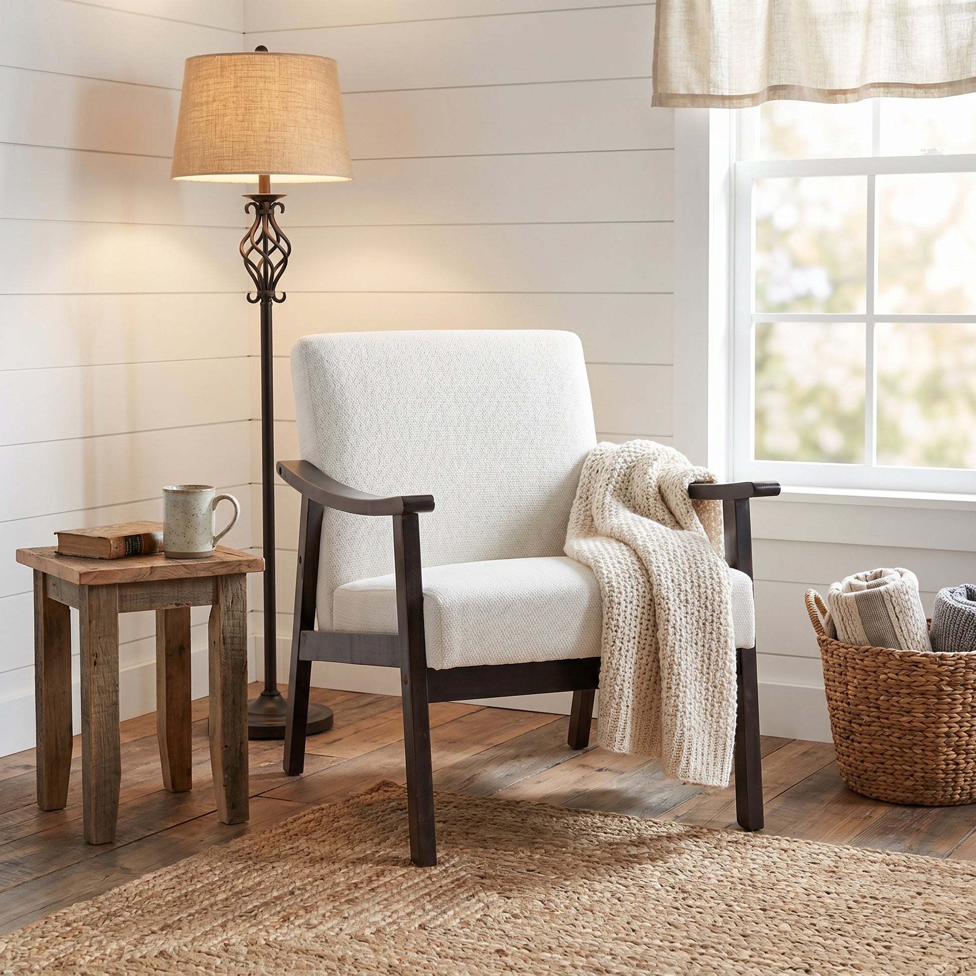Champlain white accent chair showing a styled seating area with side table and lamp
