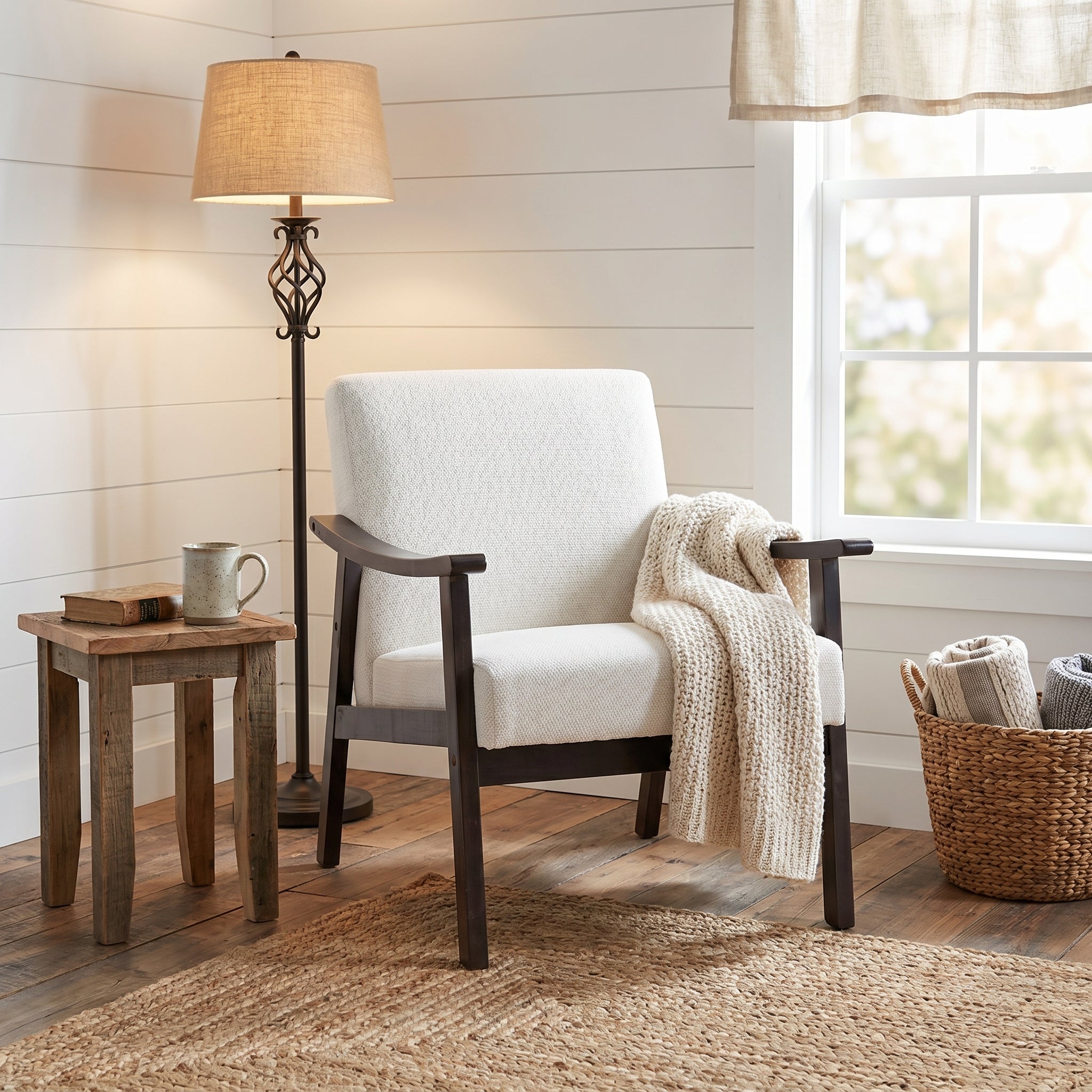Champlain white accent chair showing a styled seating area with side table and lamp