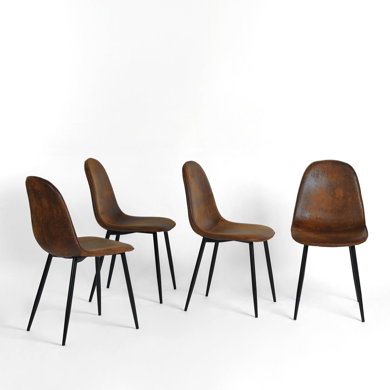 Charlton suede brown dining chairs set of 4 shown from alternate angles on white background