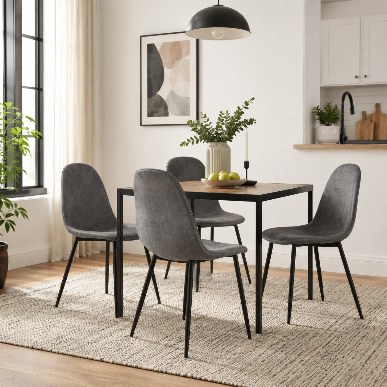 Charlton grey terry fabric shell dining chairs around a black dining table in a bright dining room