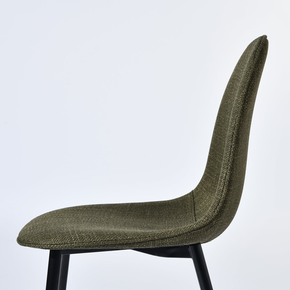 Charlton green tweed dining chair showing textured fabric detail