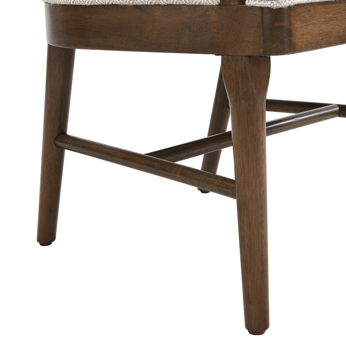 Chelan beige dining armchair close-up of the solid rubberwood leg and side stretcher detail