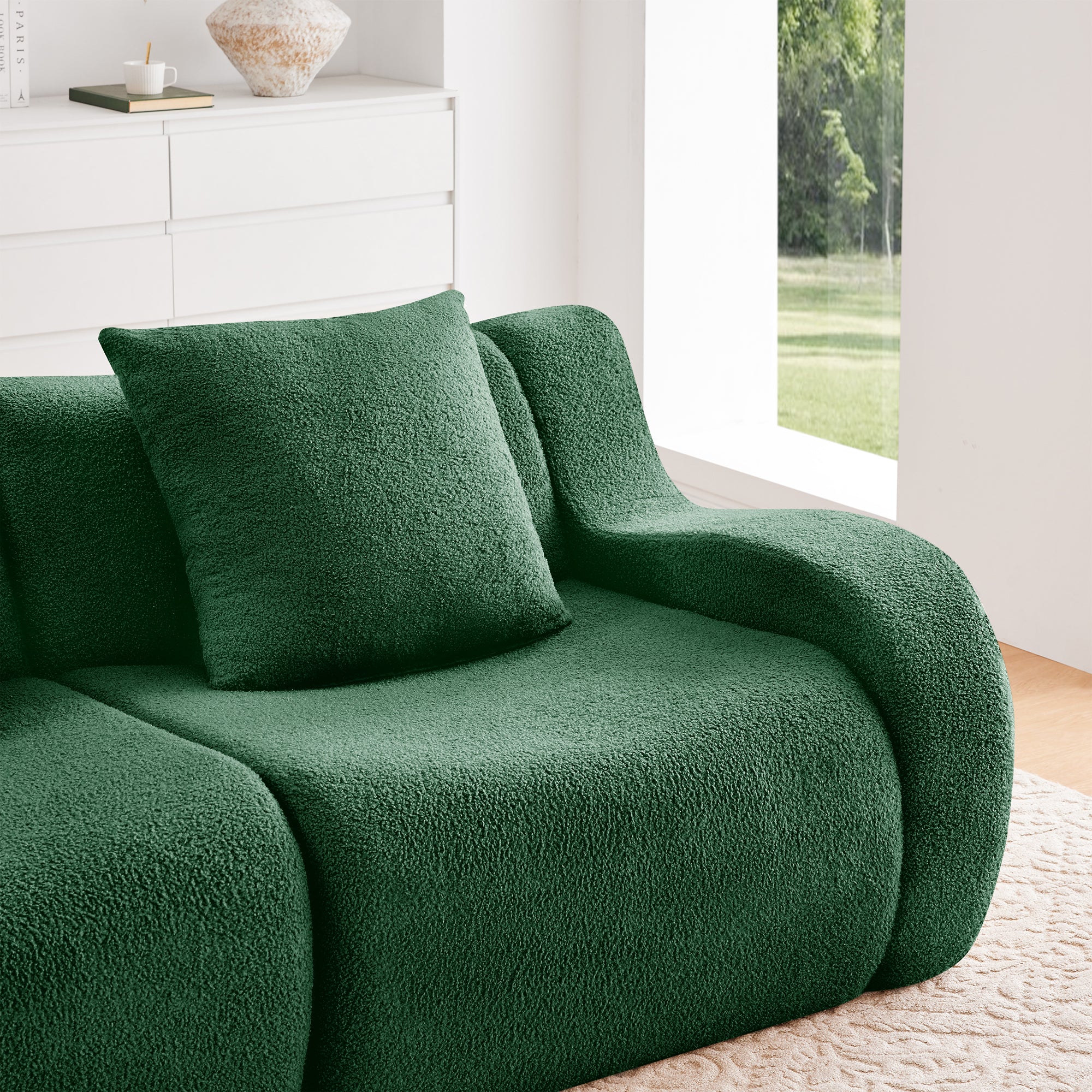 Chico green teddy fabric modular sofa curved armrest and cushion detail