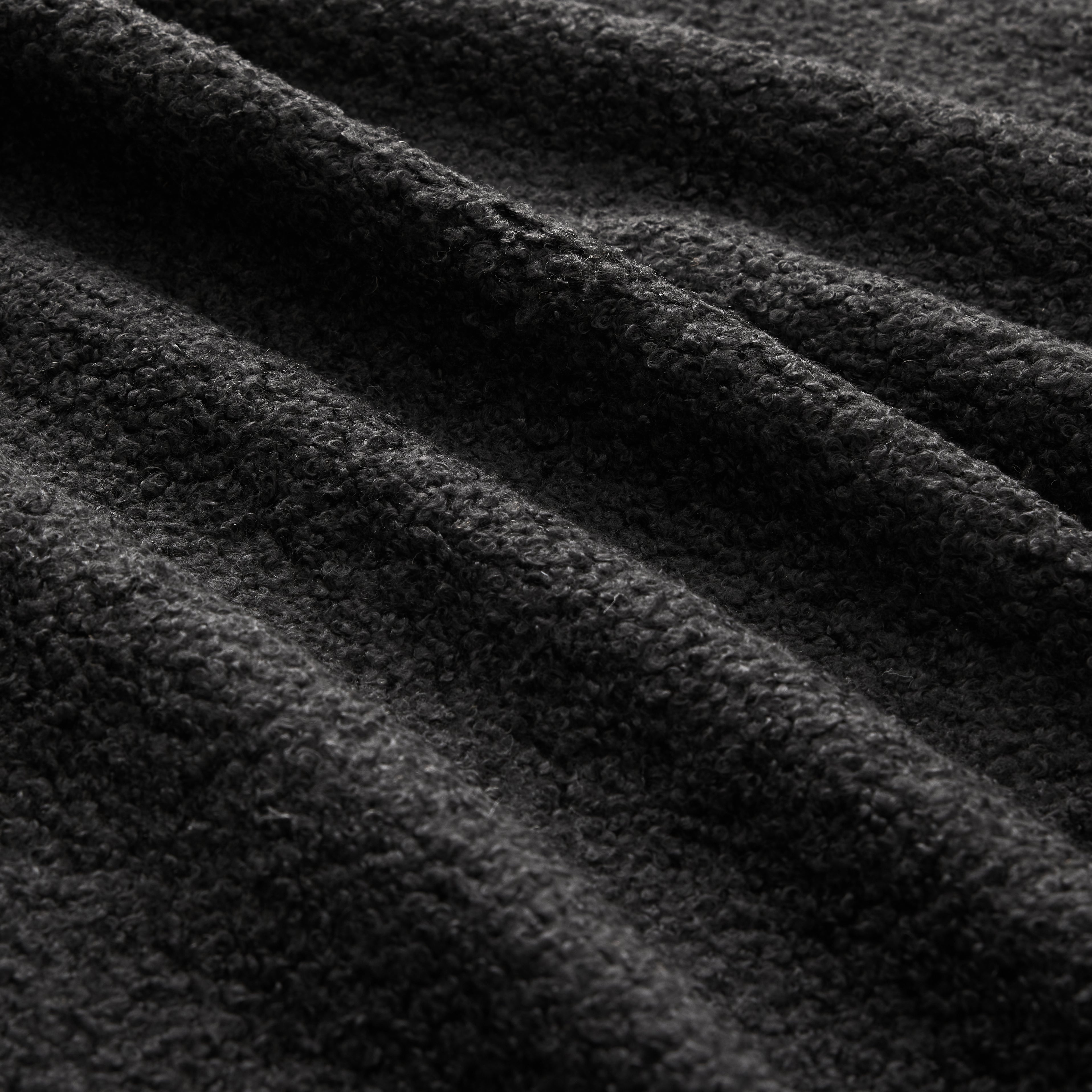 Chico black loveseat sofa soft teddy fabric texture close-up detail