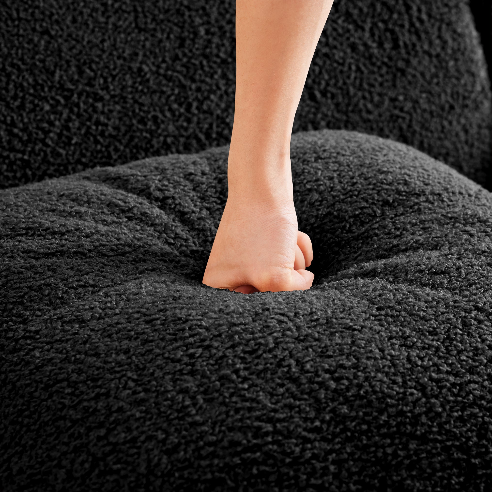Chico black loveseat sofa cushion compression detail in teddy fabric