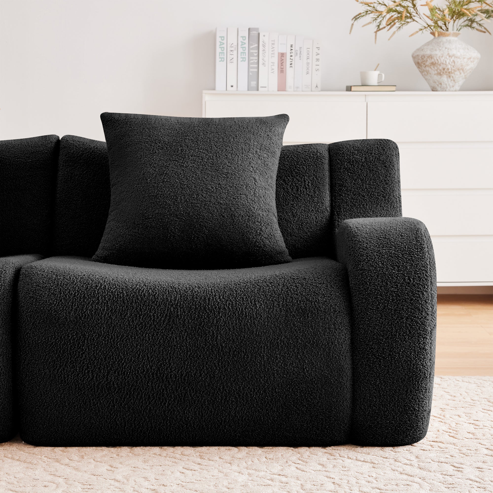 Chico black loveseat sofa front seat detail with soft teddy fabric upholstery