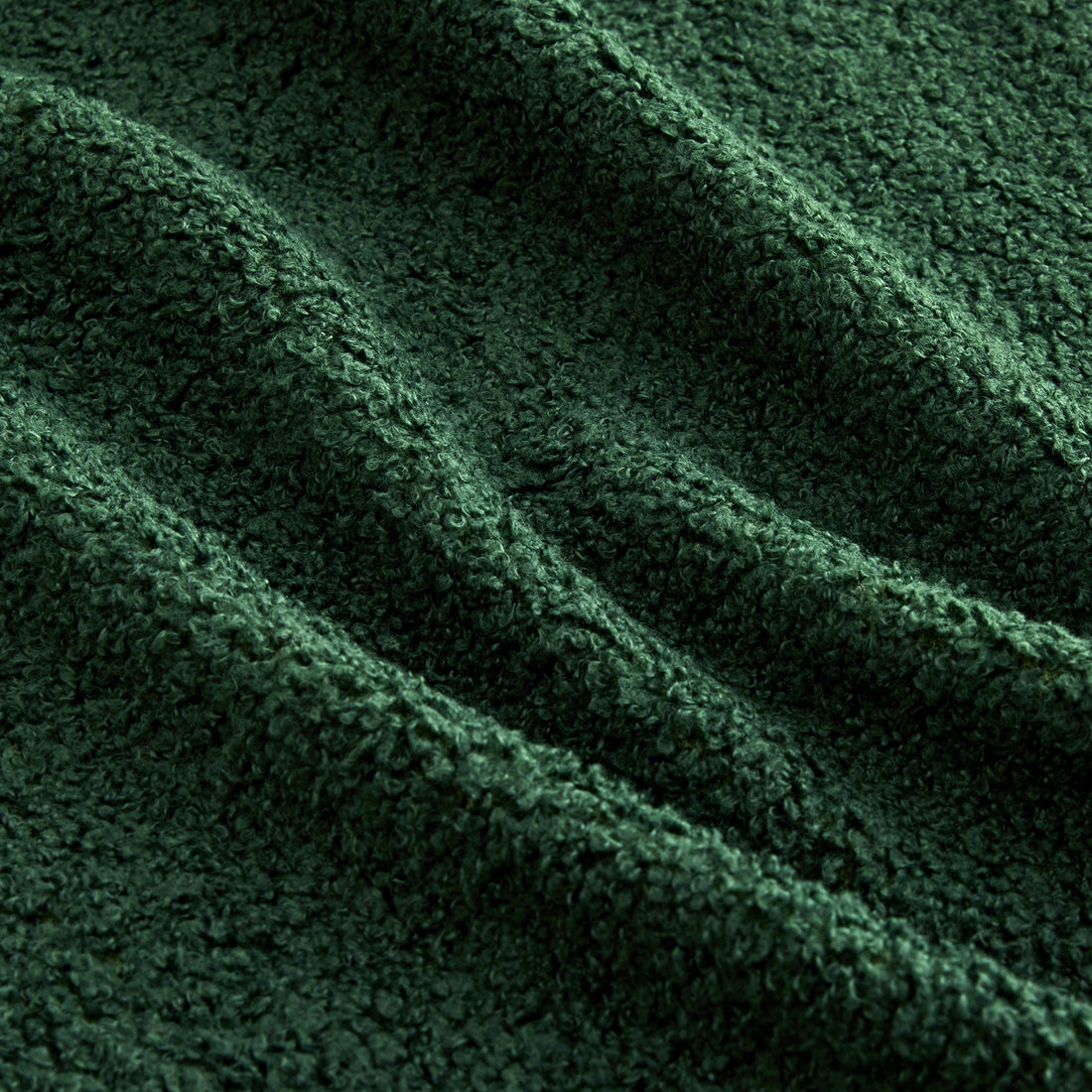 Chico green loveseat sofa showing close-up teddy fabric texture