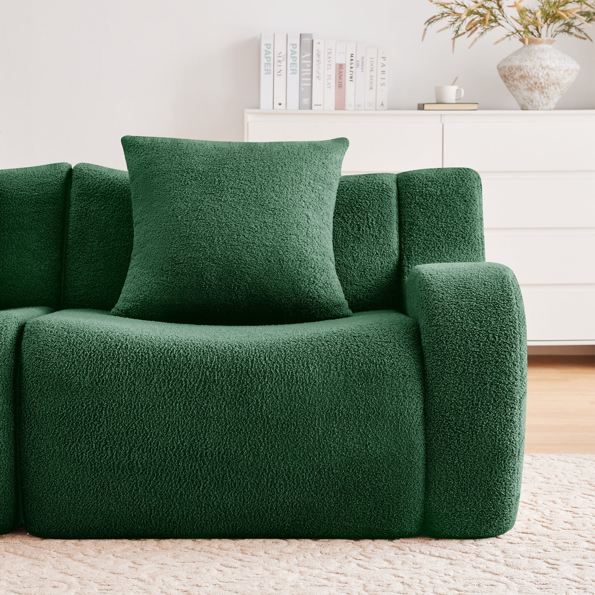Chico green loveseat sofa showing pillow armrest and seat cushion detail