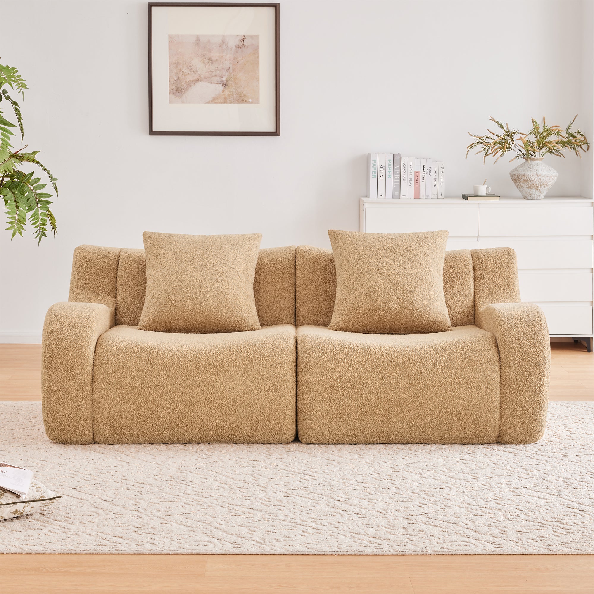 Chico light camel loveseat sofa showing modular chaise layout in a warm living room