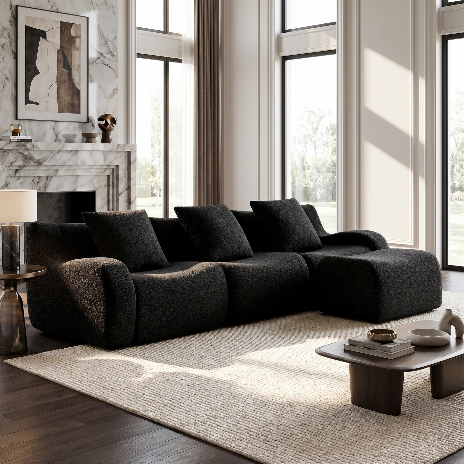 Chico black sectional sofa in modern living room with fireplace and floor-to-ceiling windows