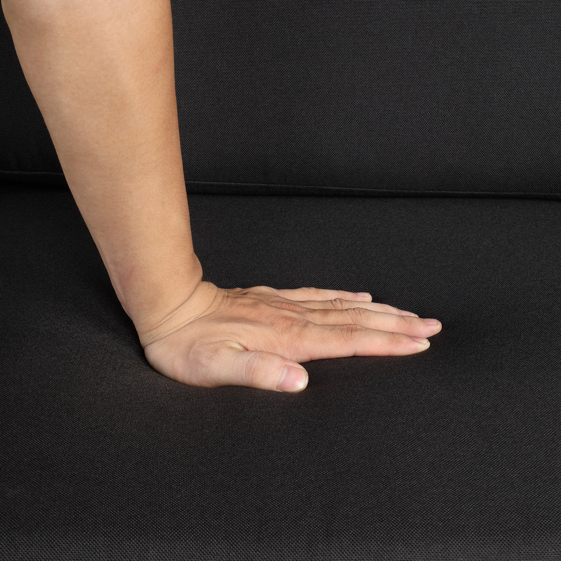Chula black loveseat sleeper sofa showing padded seat cushioning detail