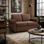 Chula brown linen loveseat sleeper sofa styled in a warm living room